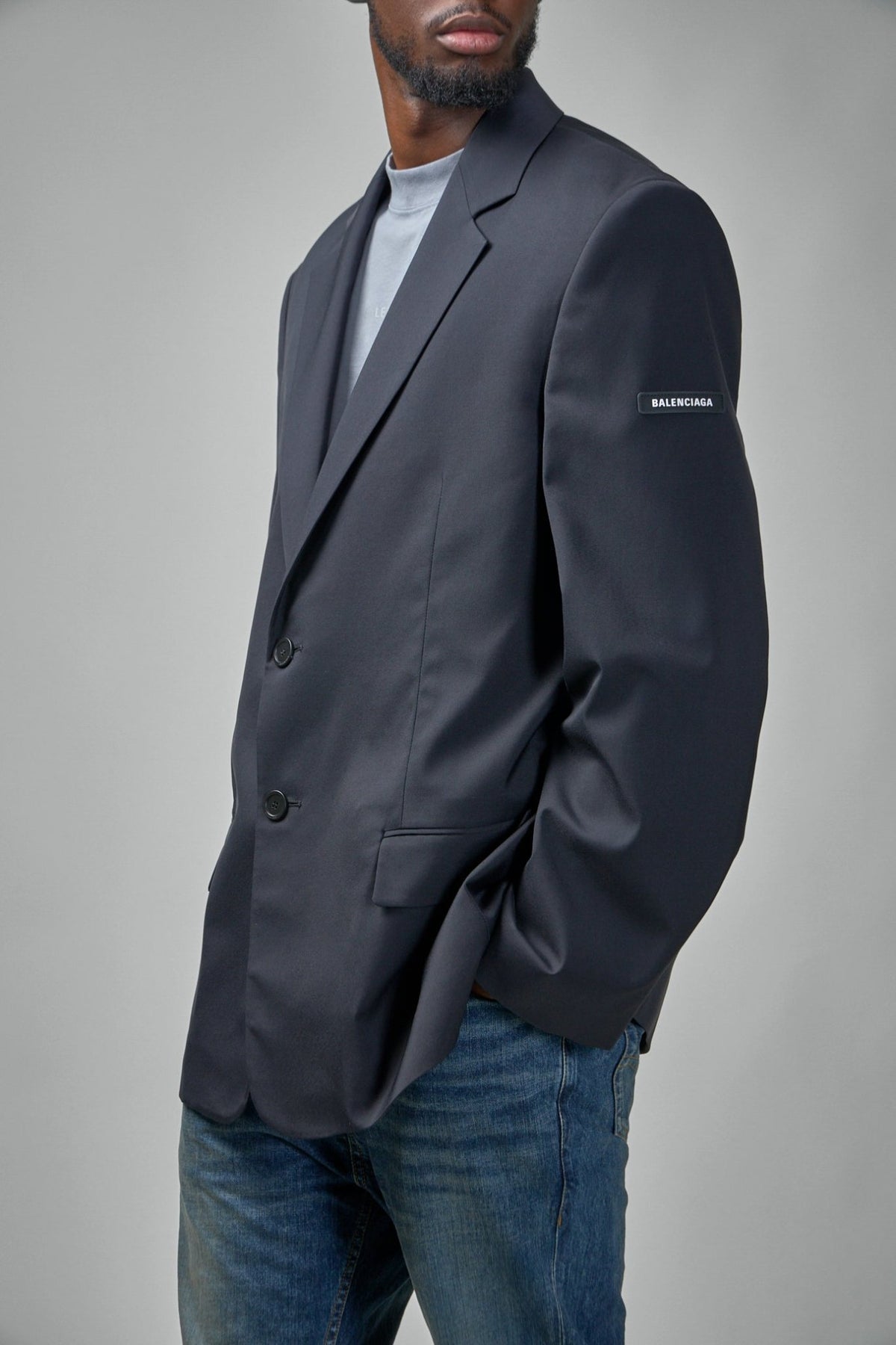 Side view of Balenciaga Washed SB Jacket highlighting the relaxed fit silhouette