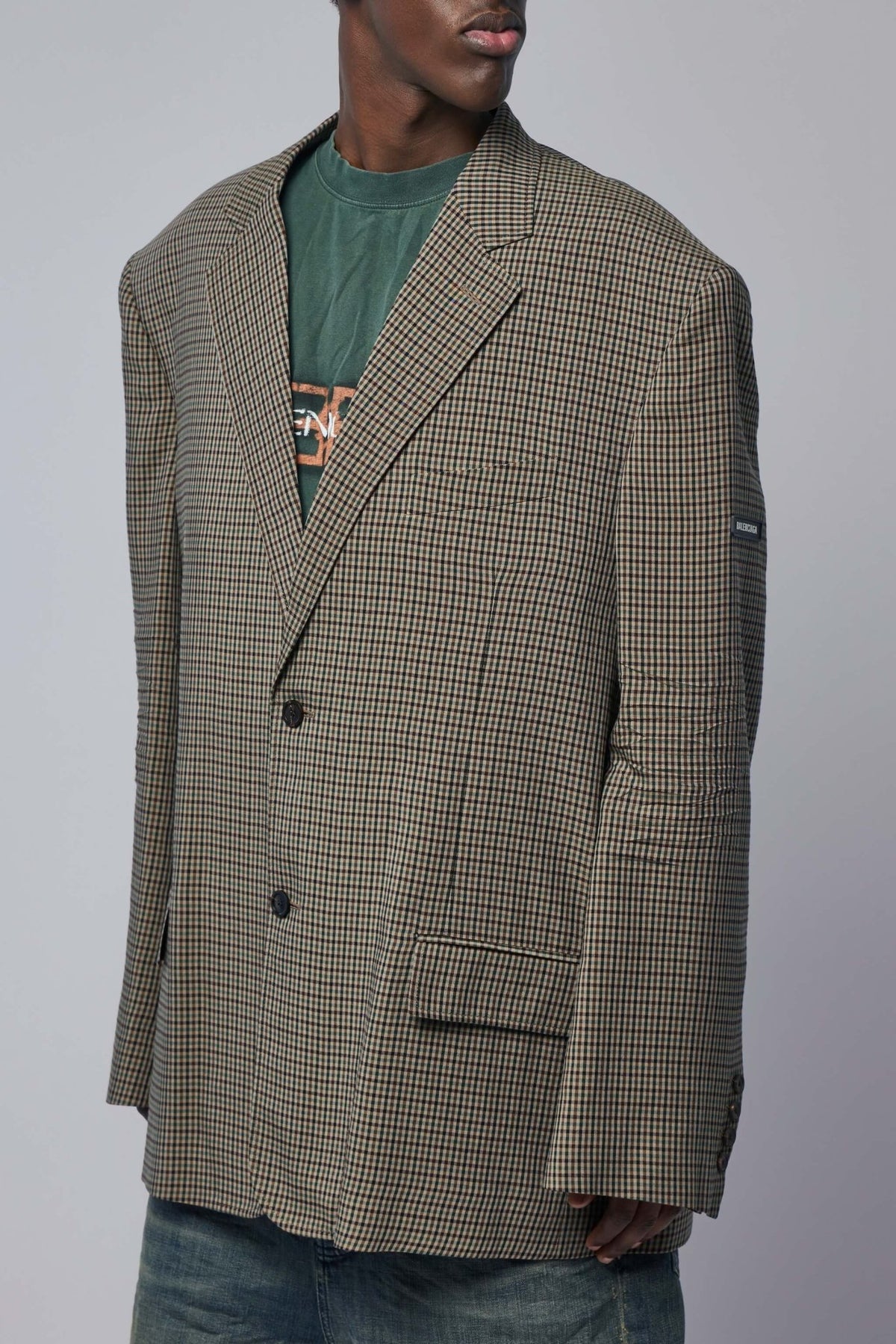 Side view of relaxed fit Balenciaga blazer showing contemporary silhouette