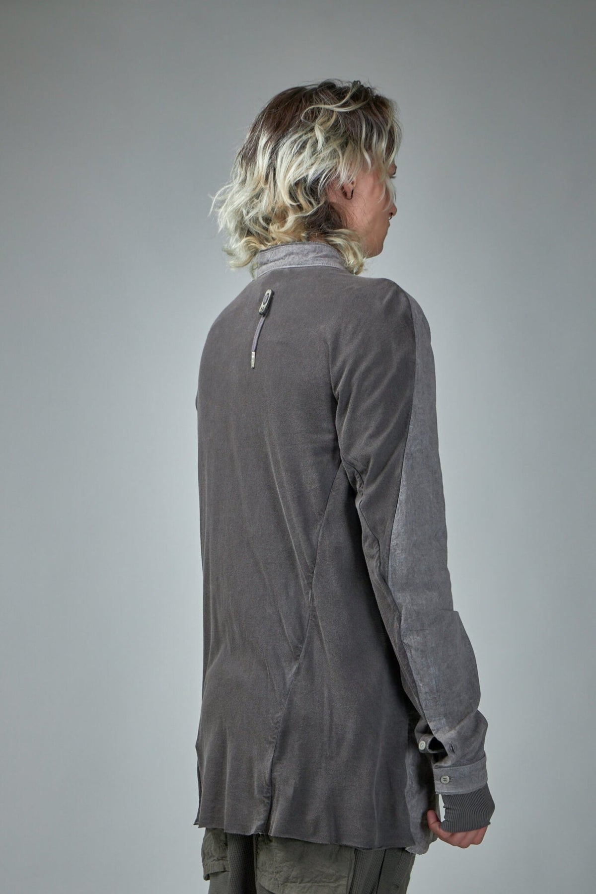 Back view showing drawstring adjustment feature on SHIRT1