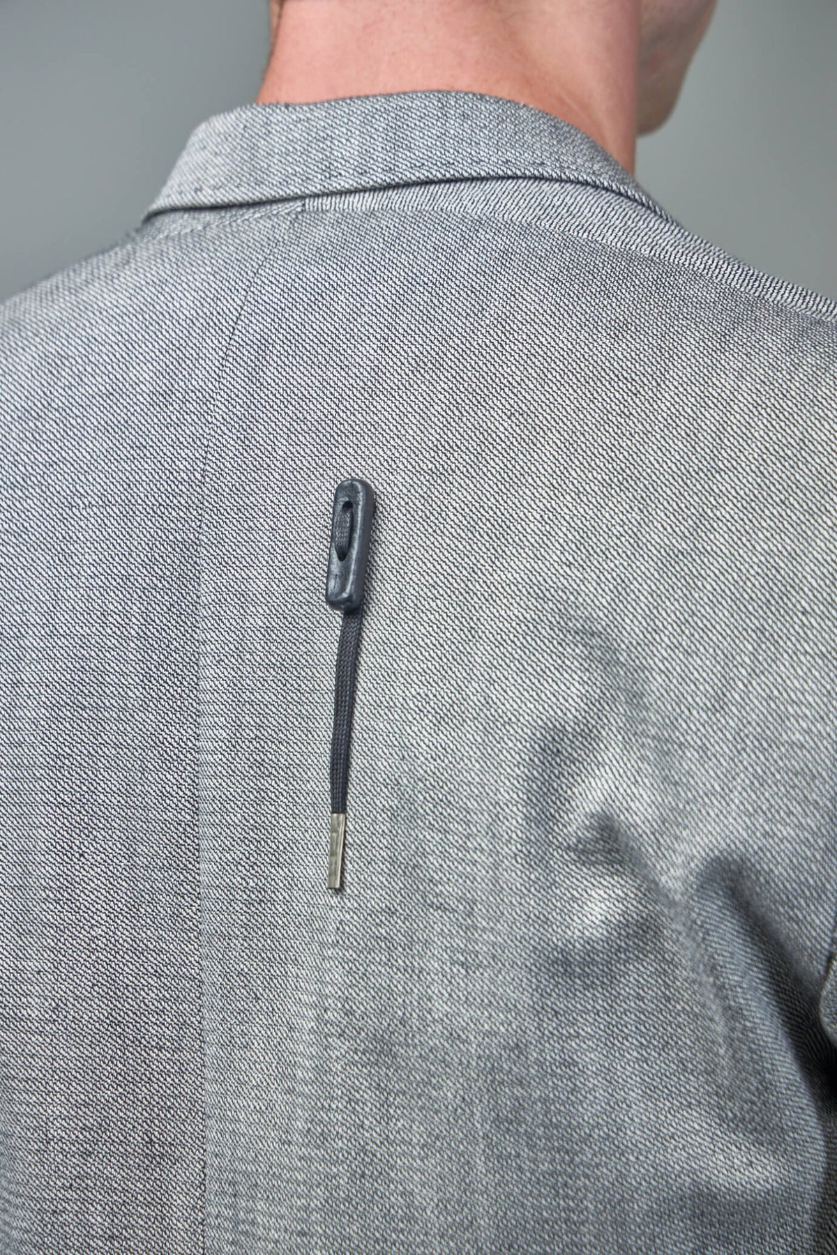 Side profile of Boris Bidjan Saberi Suit3 blazer with rear vent