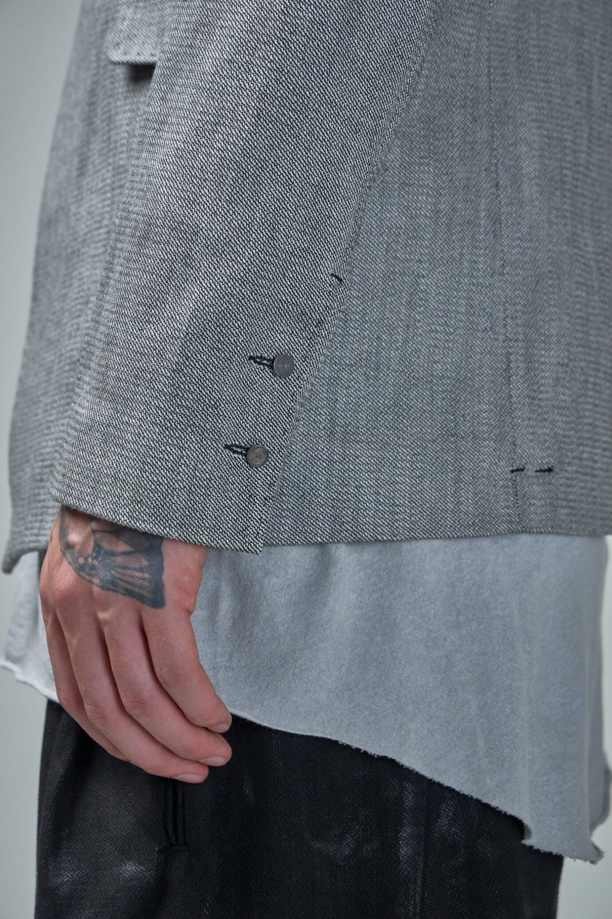 Close-up of buttoned cuffs on Boris Bidjan Saberi blazer