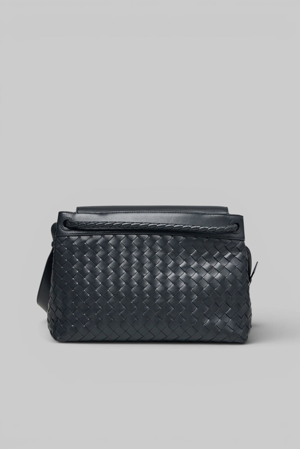 Metallic loop closure on Bottega Veneta Avenue Intrecciato clutch