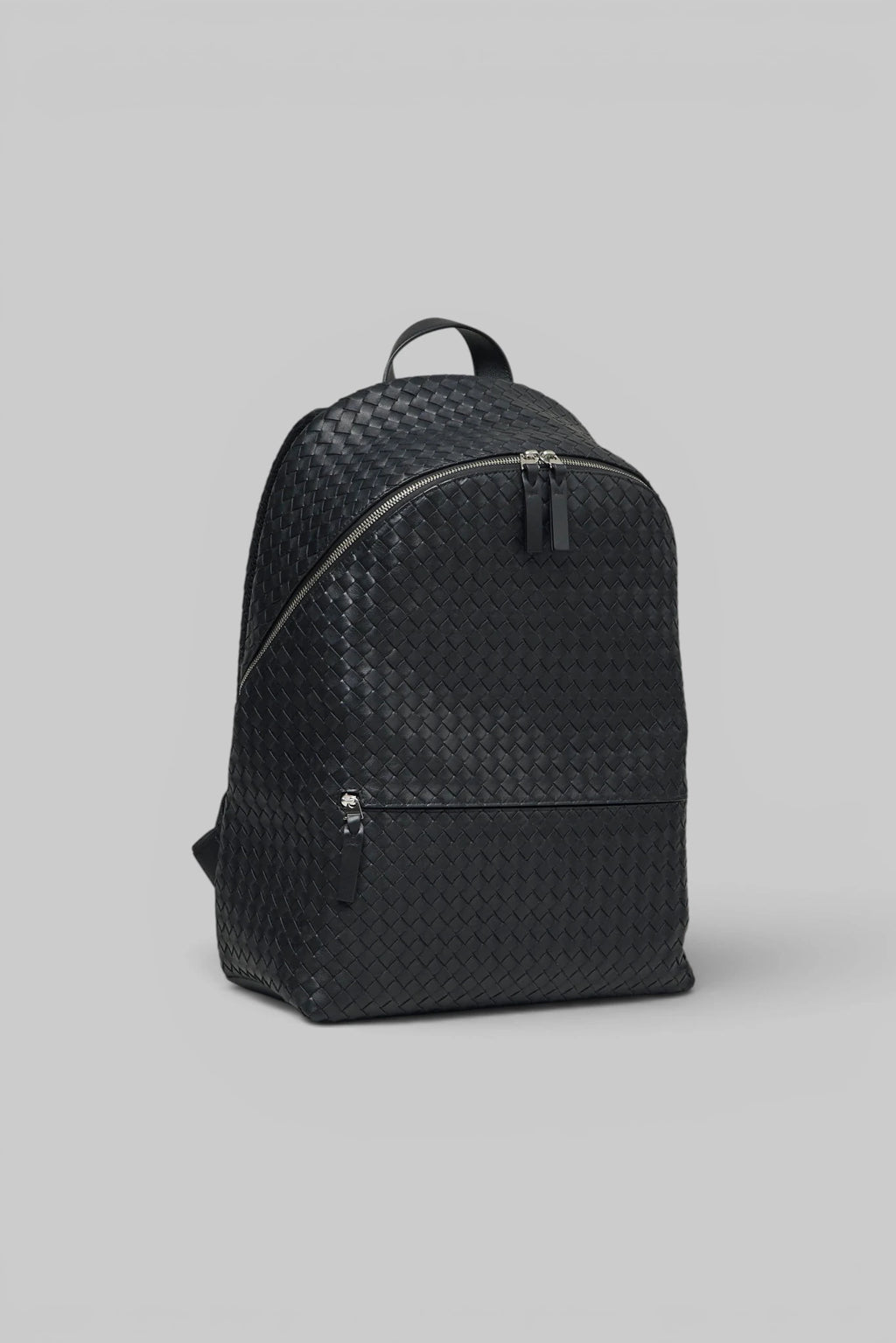 Close-up of Intrecciato weave texture on Bottega Veneta backpack