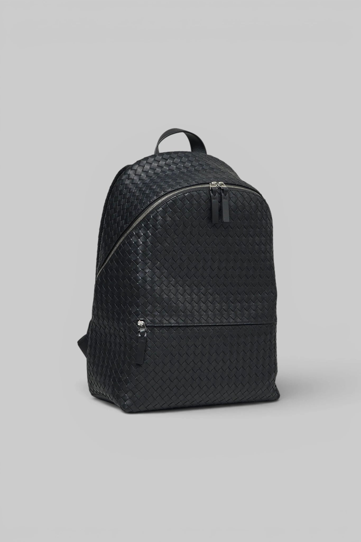 Close-up of Intrecciato weave texture on Bottega Veneta backpack