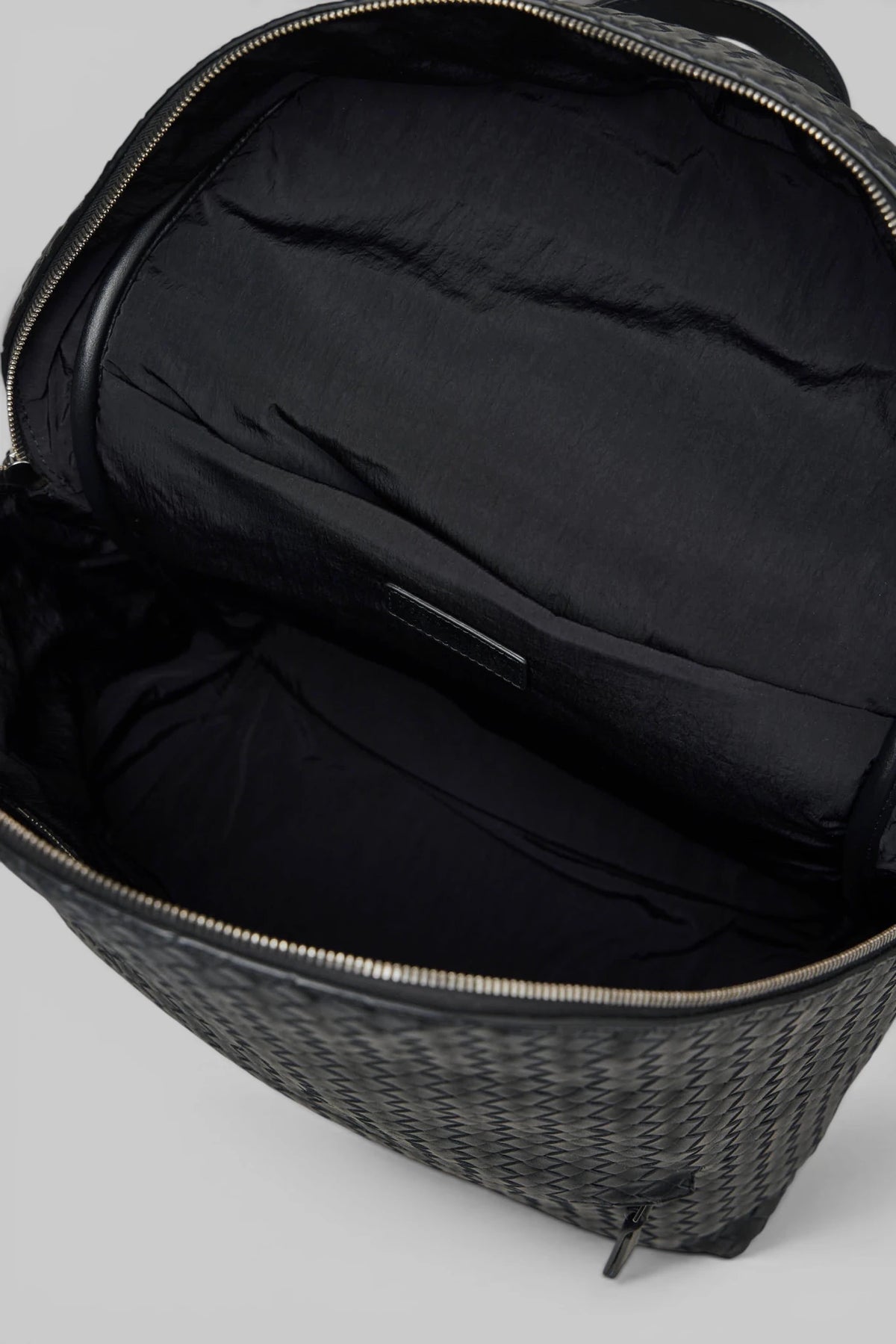 Bottega Veneta Intrecciato backpack side profile