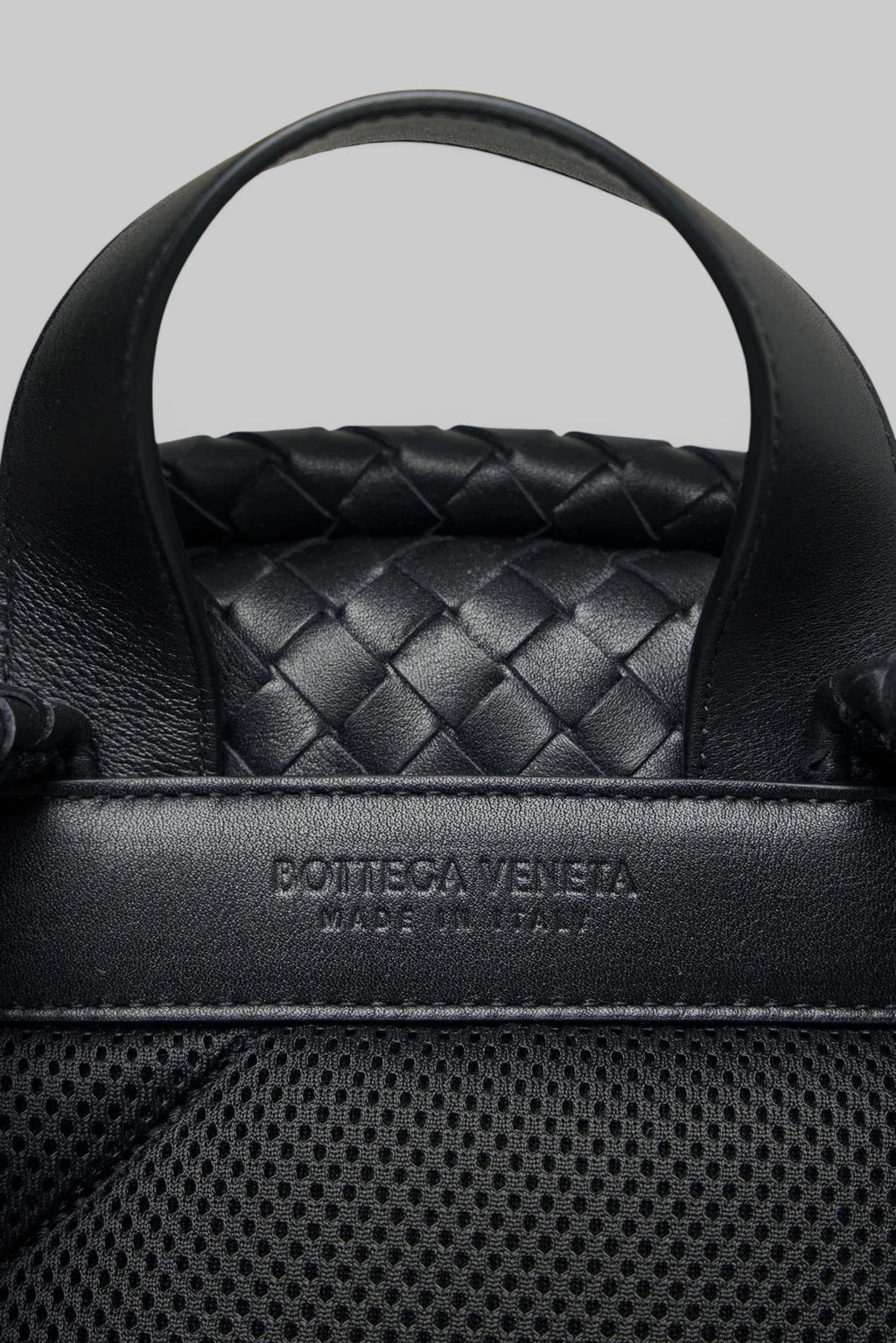 Bottega Veneta leather backpack carry handle close-up