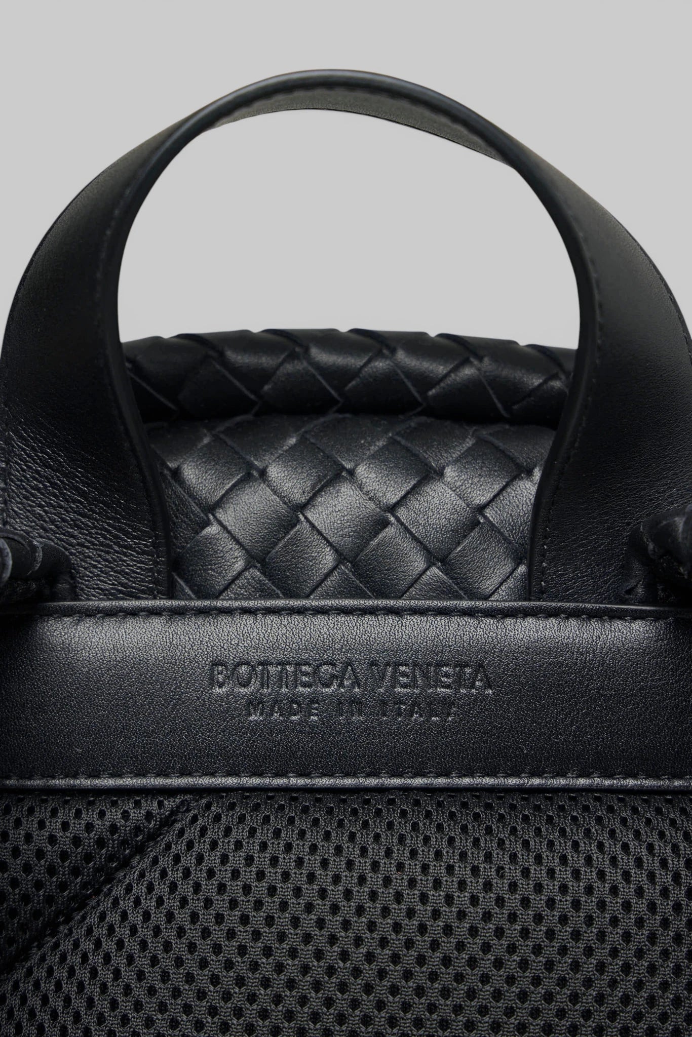 Bottega Veneta leather backpack carry handle close-up