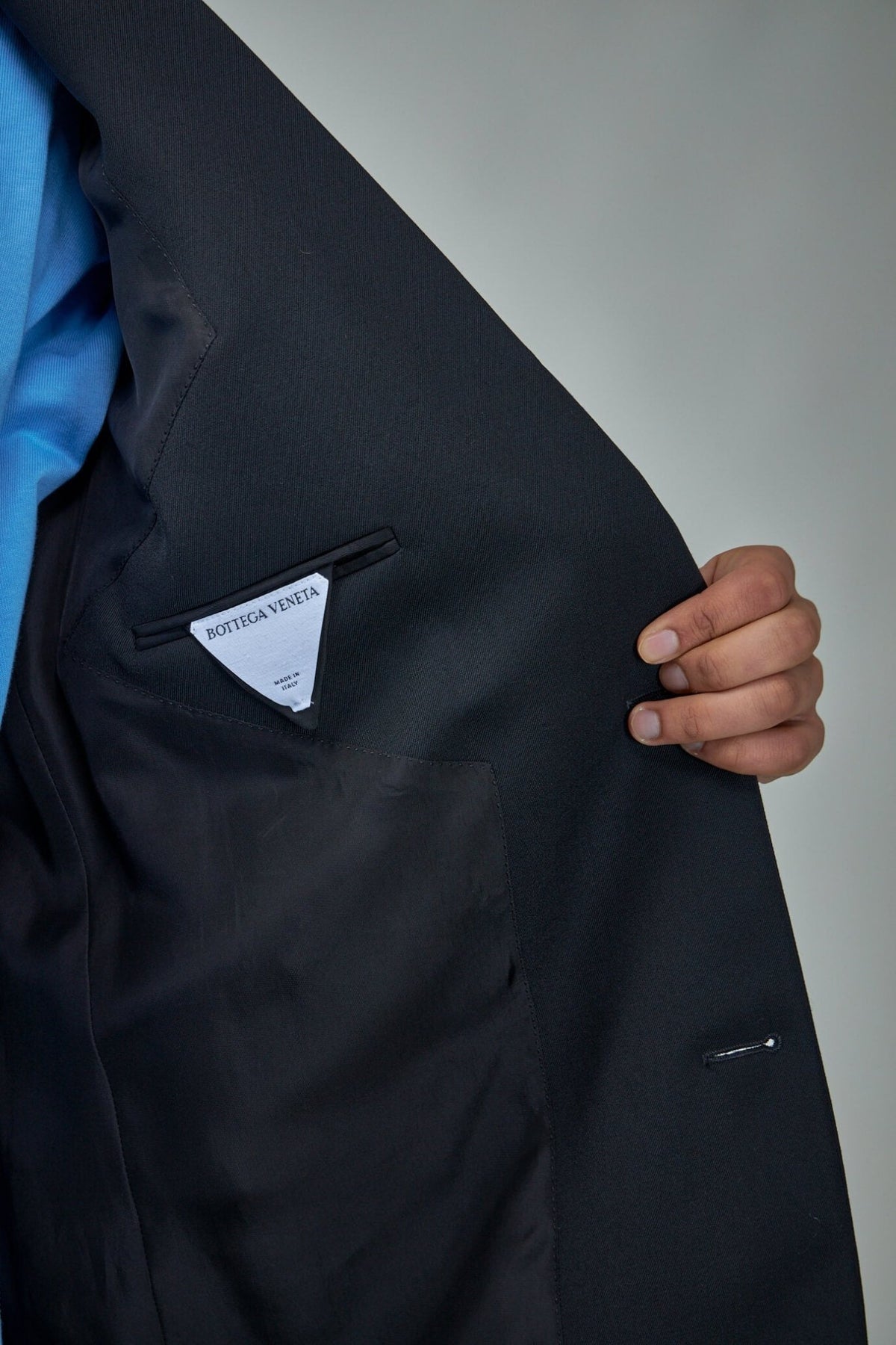 Back view highlighting half-lined interior and fit