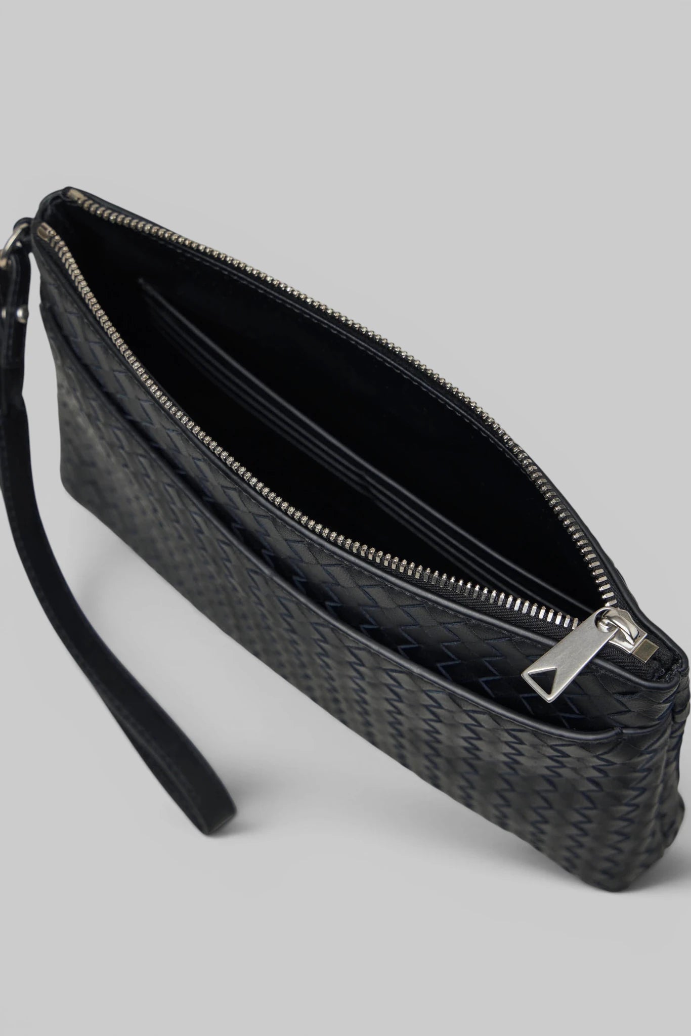 Bottega Veneta Intrecciato Nappa pouch styled as an evening accessory