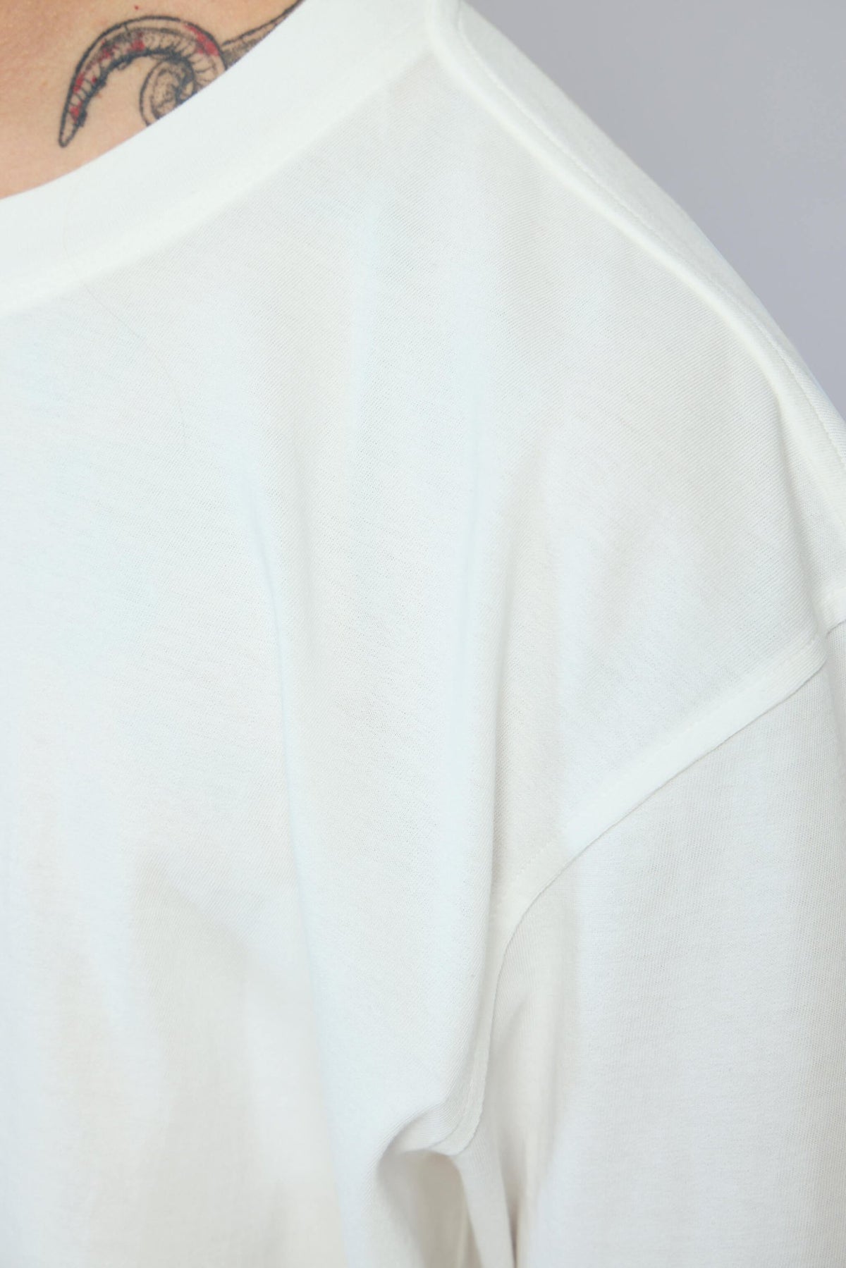 Bottega Veneta t-shirt styled with casual trousers, lifestyle shot