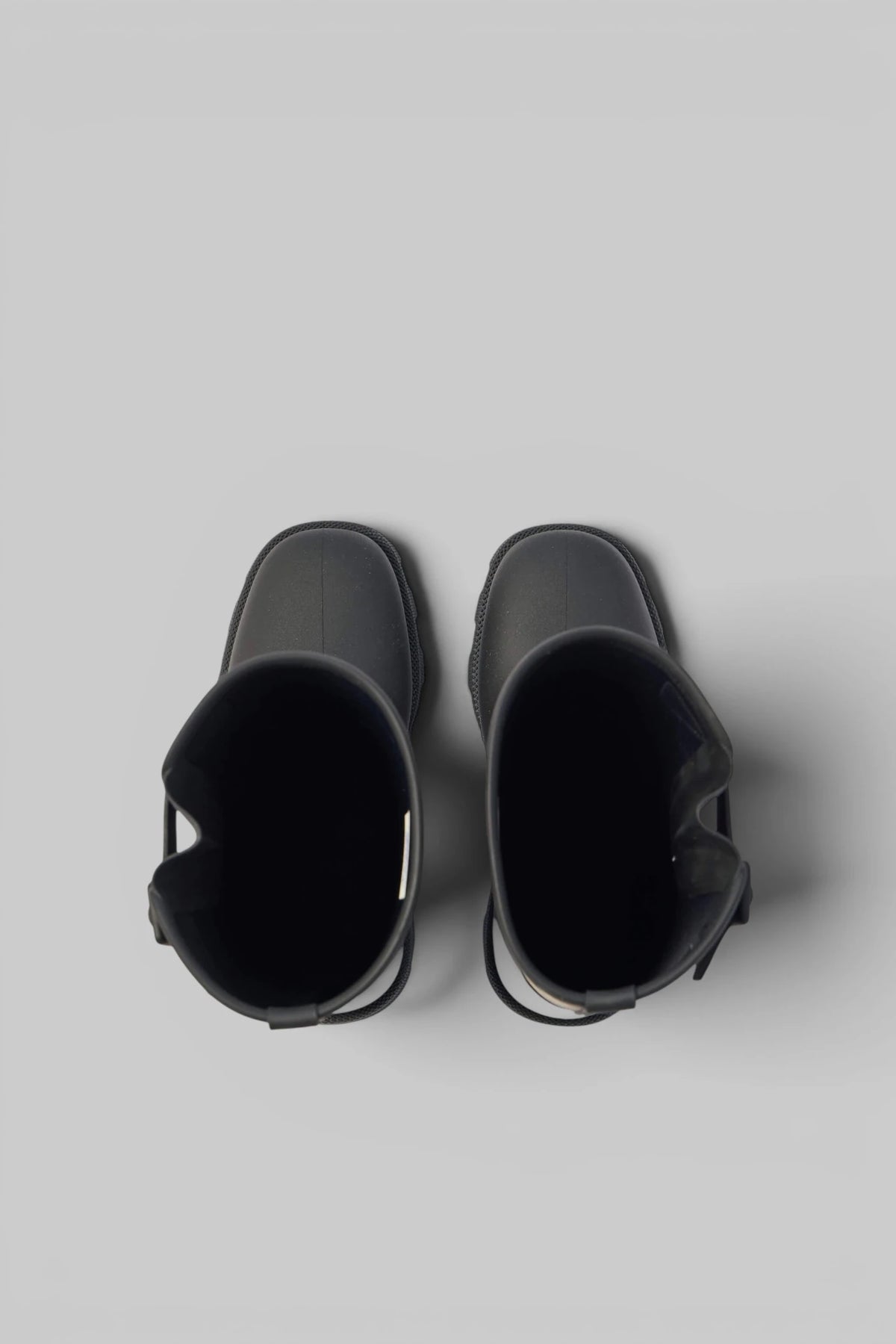 Side view of Burberry high boots featuring weather-resistant construction