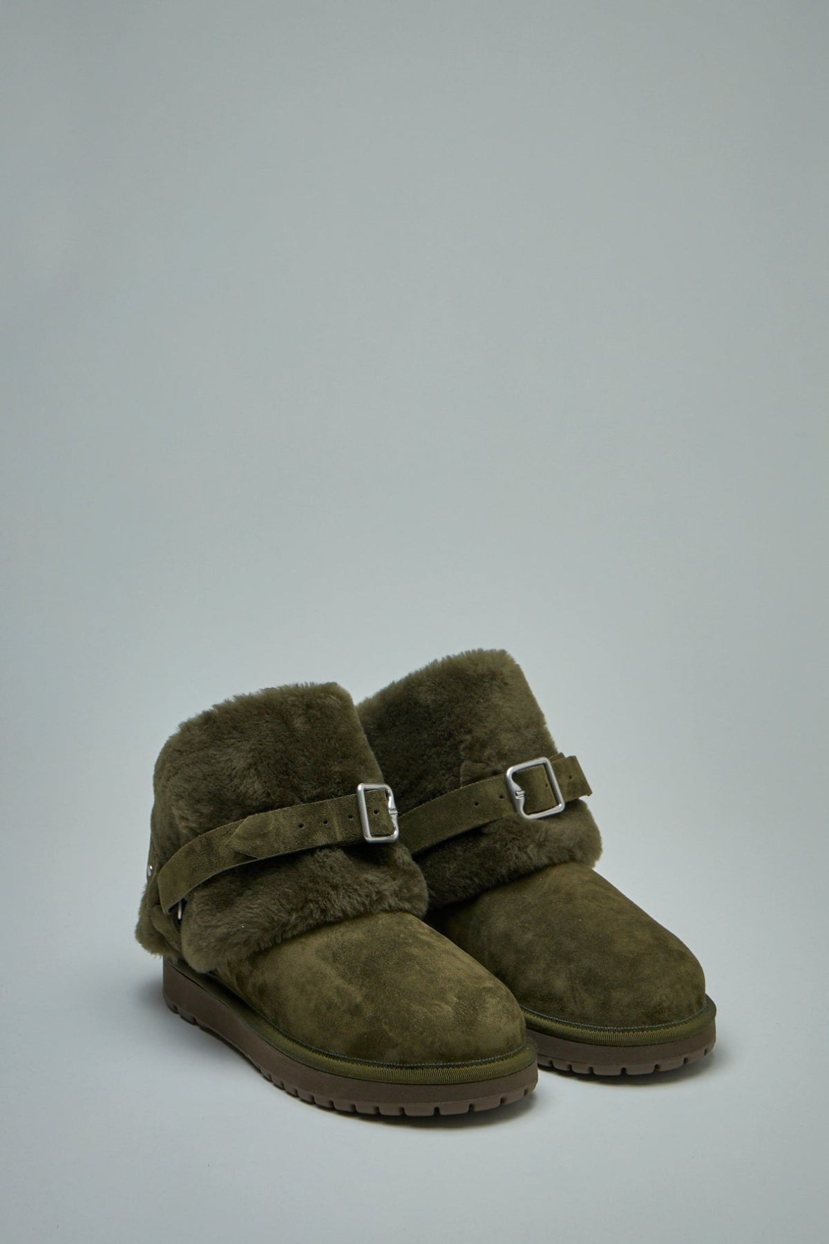 Close-up view of Burberry boot showing premium suede texture and shearling lining