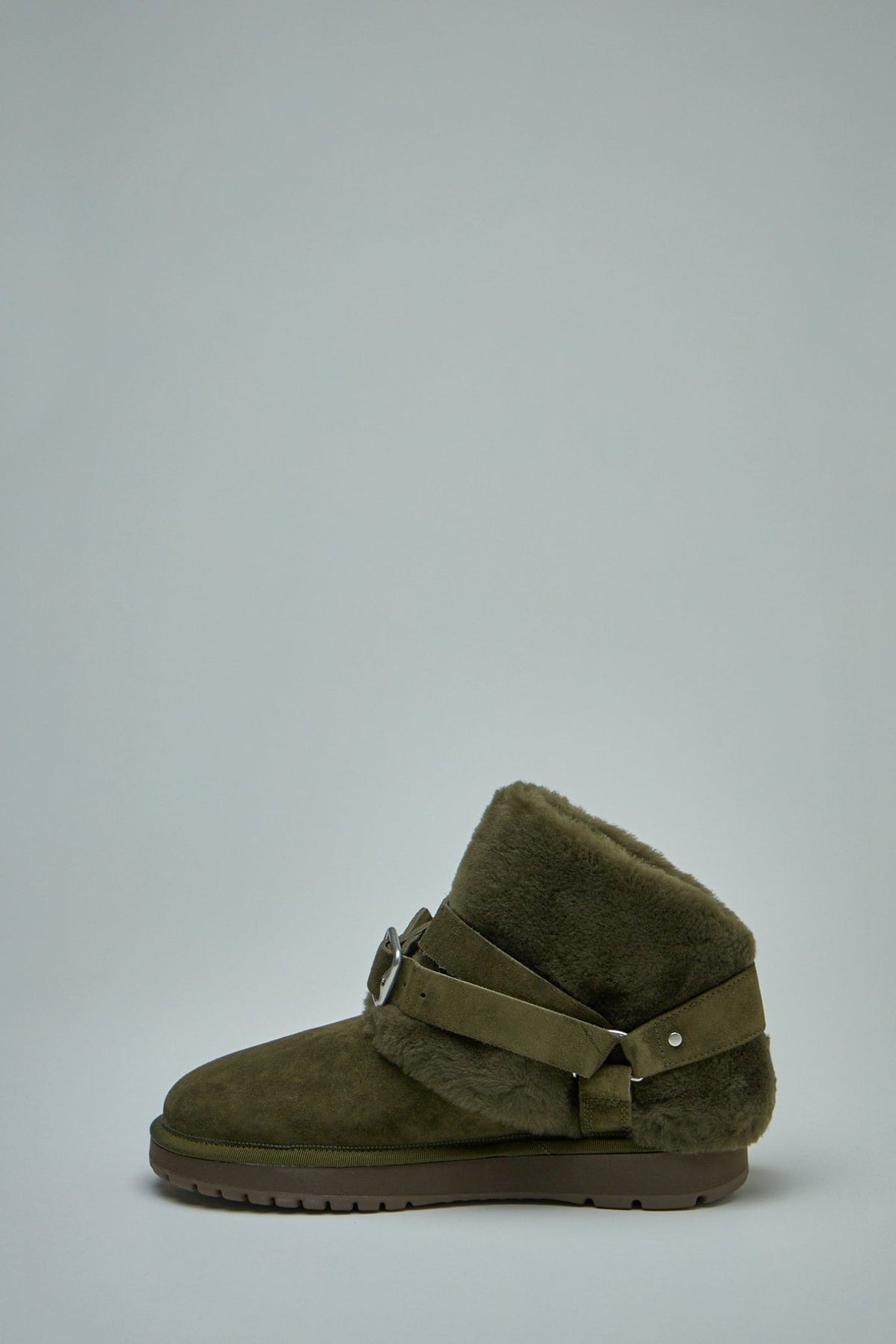 Side profile of Burberry Chubby Boots displaying equestrian Knight Design sole