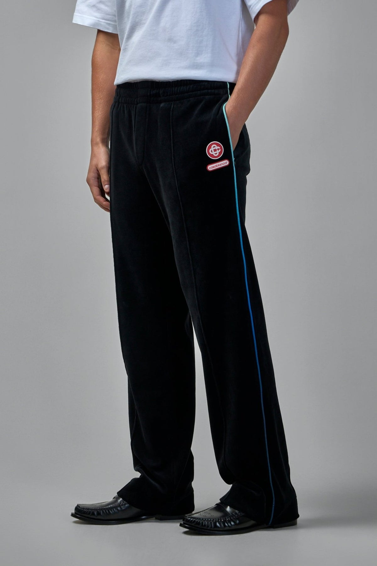 Back view of Casablanca track pants showing patch pocket and fit