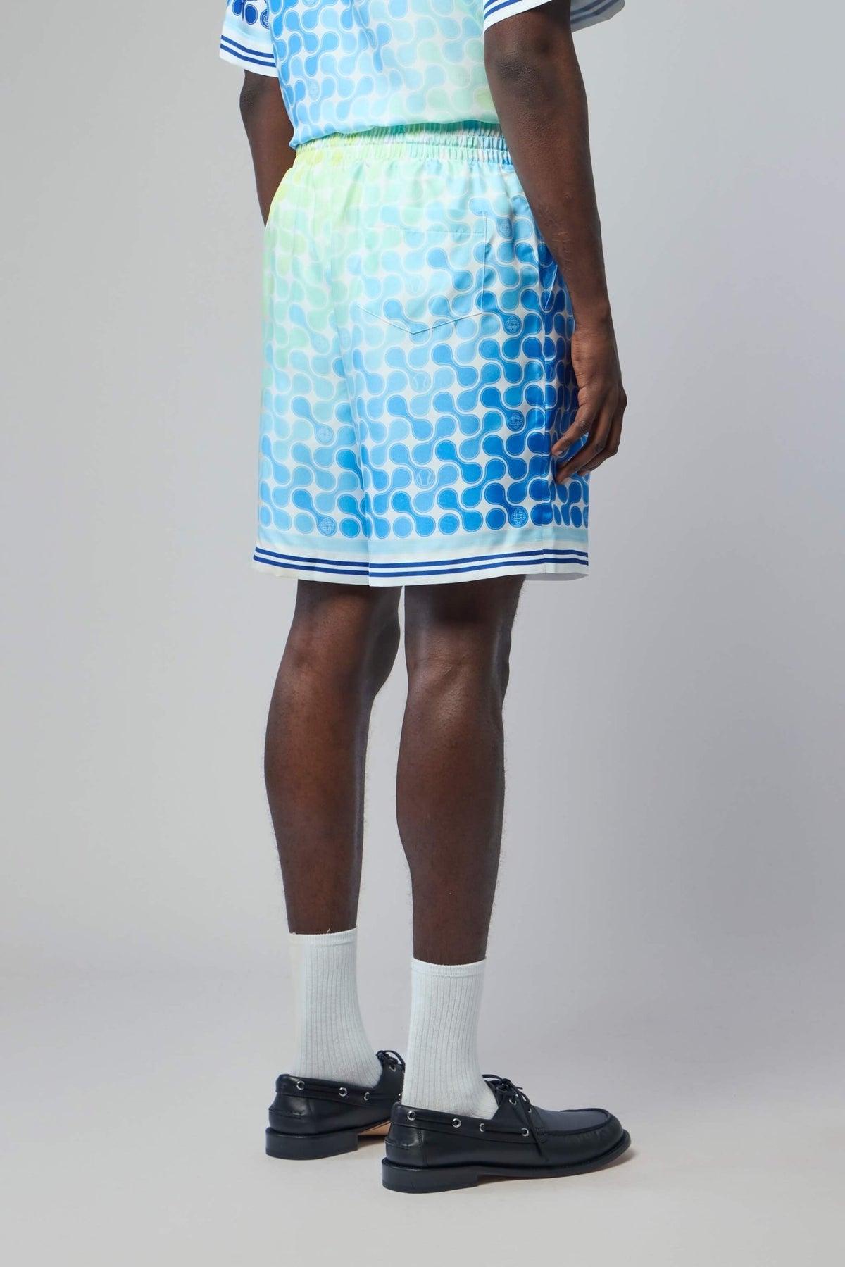 Tennis tile pattern detail on premium silk fabric