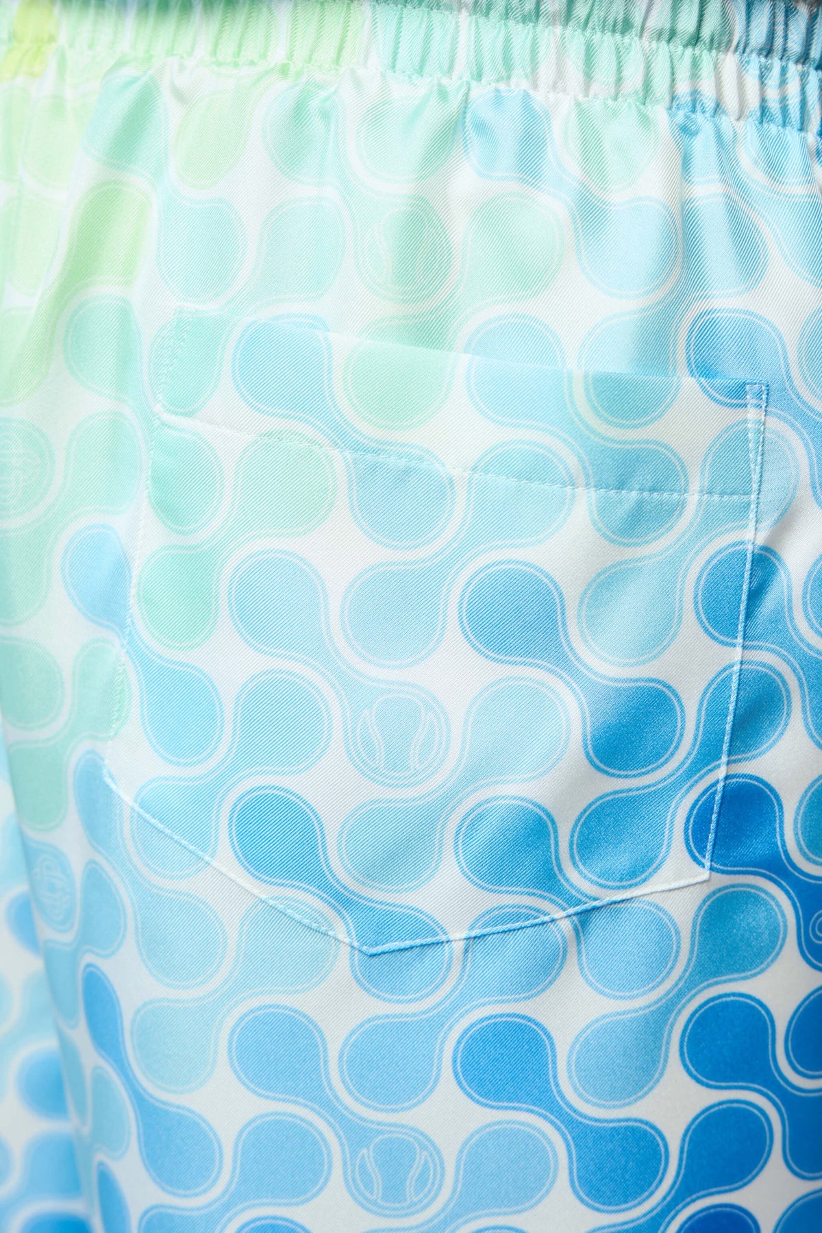 Back view of silk shorts showing fit and drape