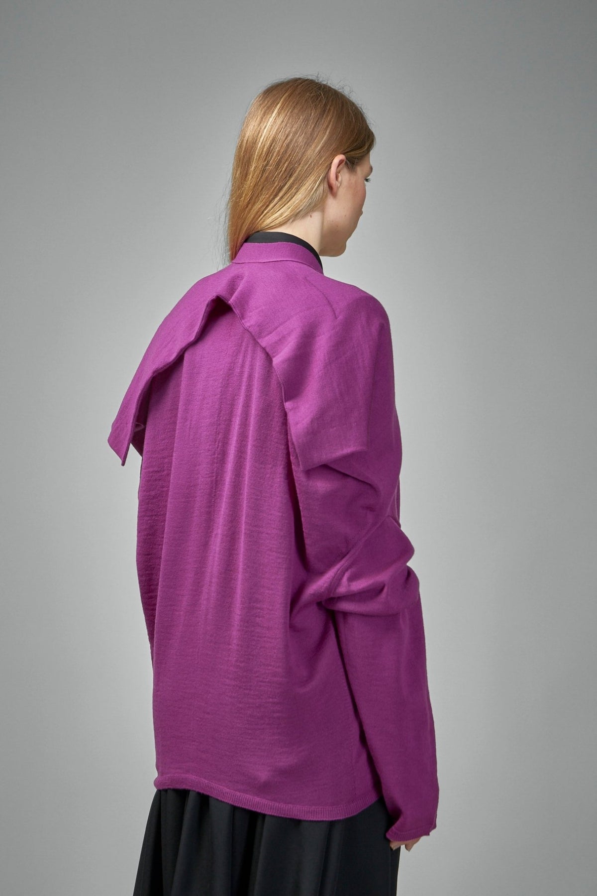 Model wearing Comme des Garçons cardigan styled for contemporary look