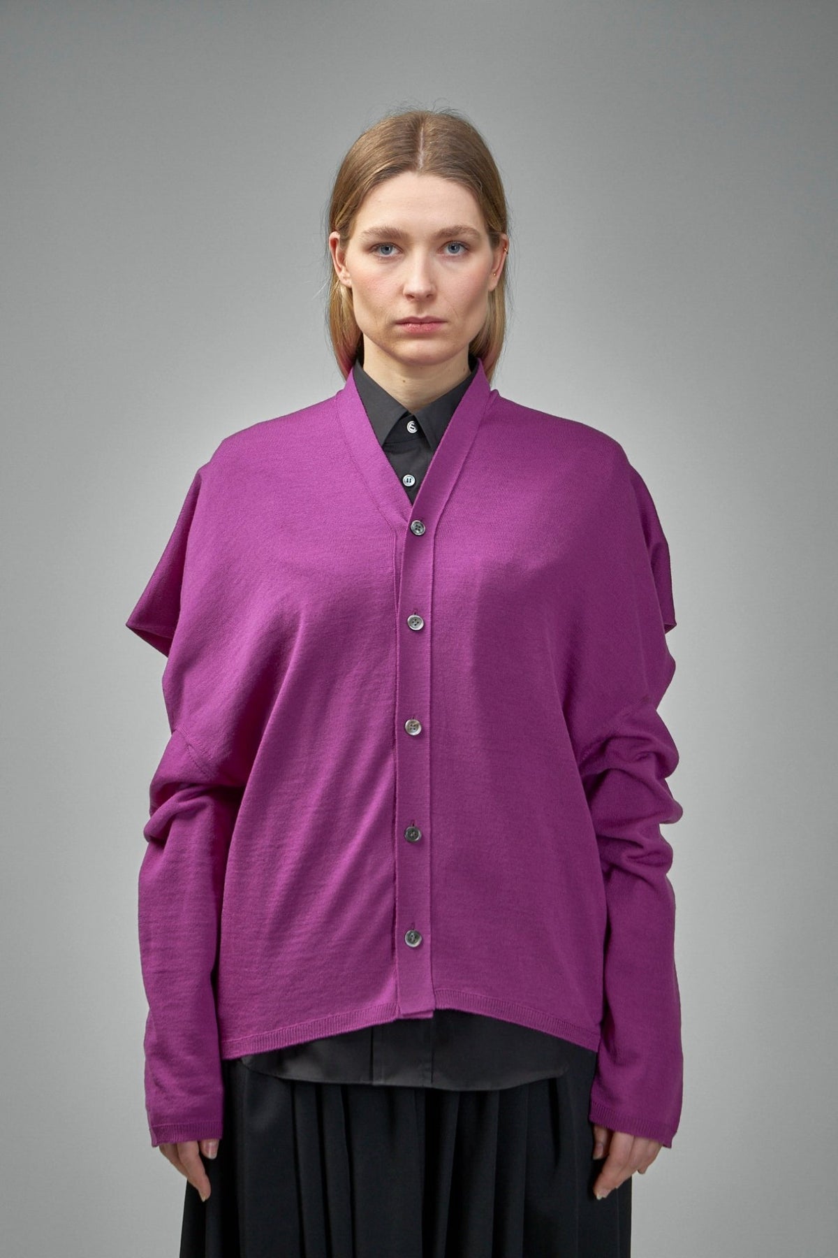 Comme des Garçons cardigans in premium wool with v-neck and button closure