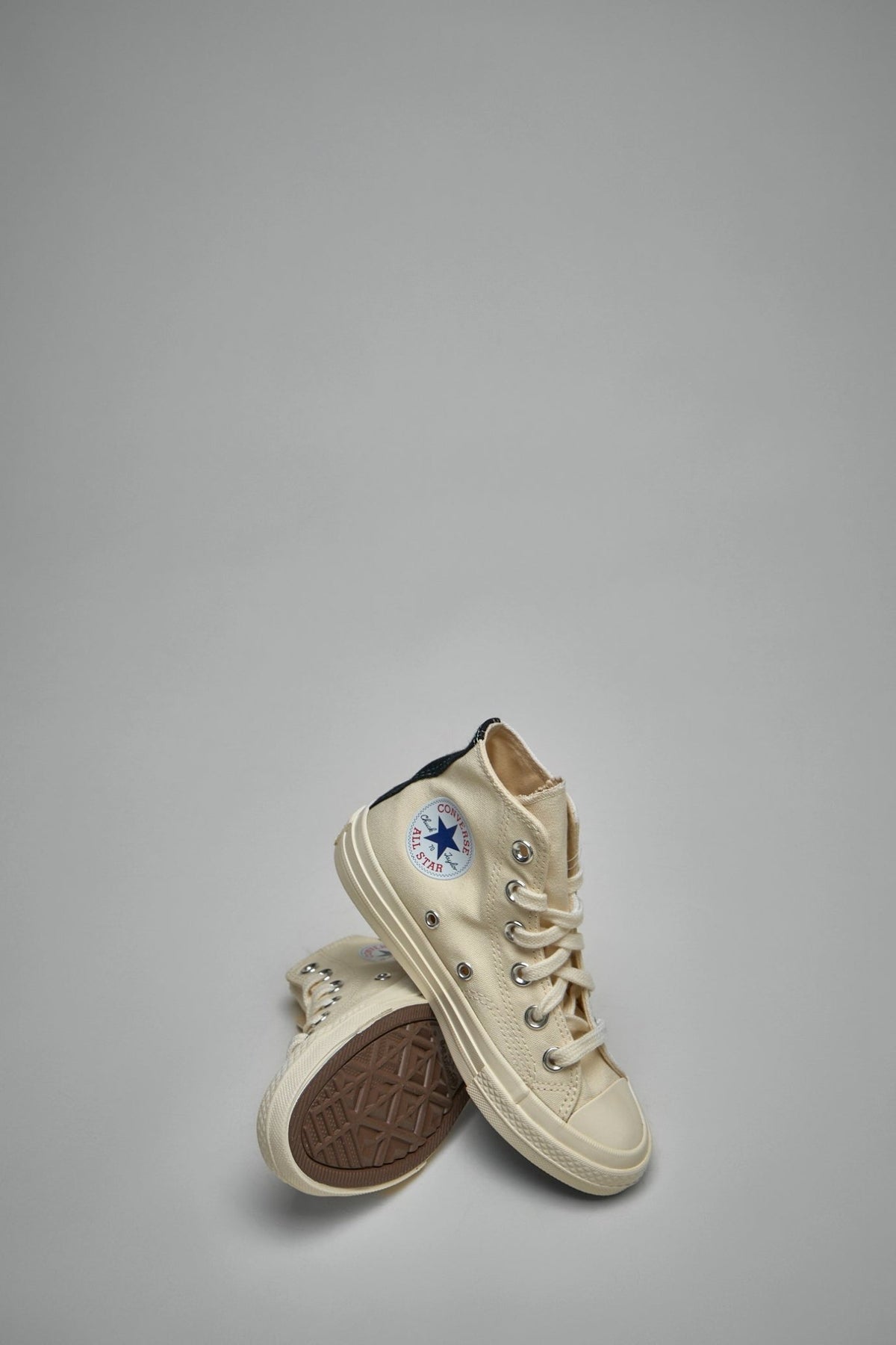 Full view of Comme des Garçons PLAY kids high top sneakers with brown textured sole