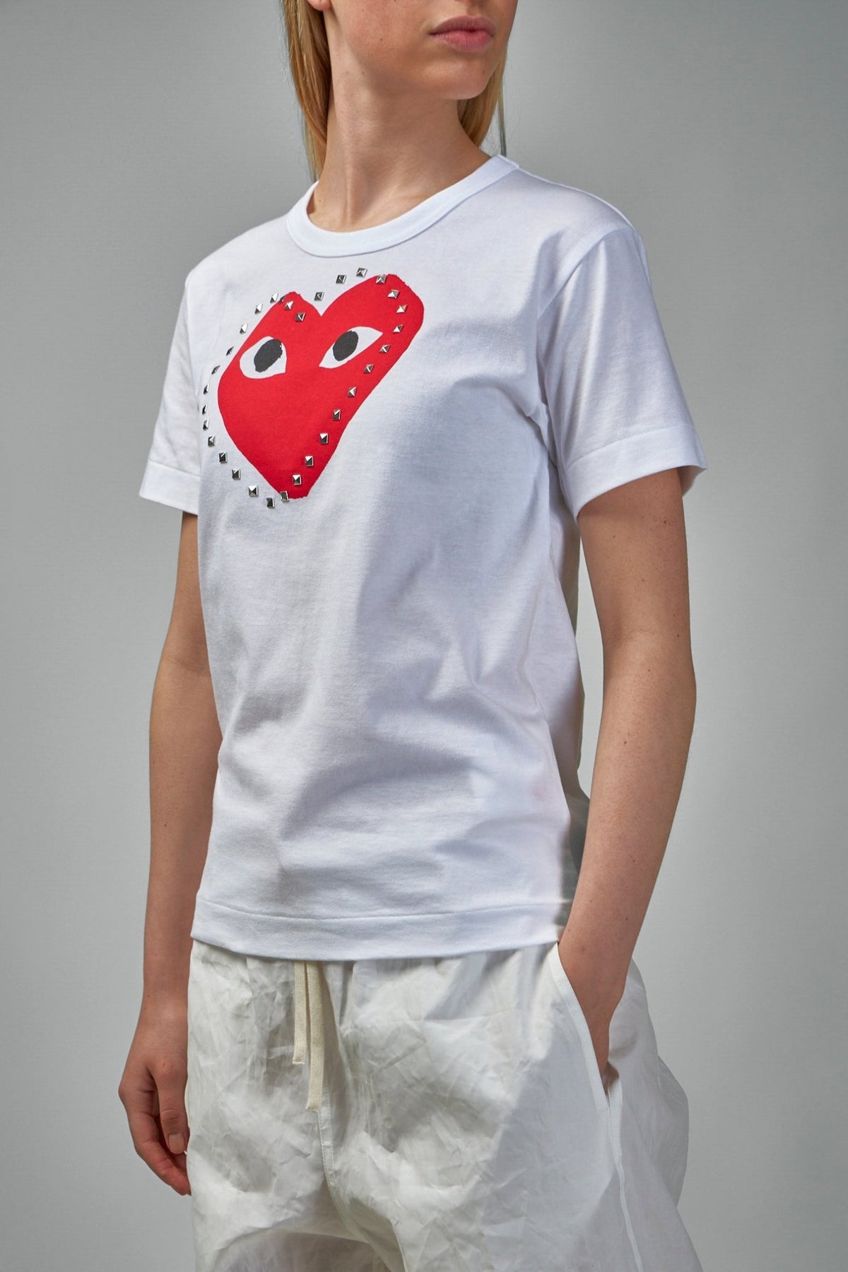 Back view of Comme des Garçons PLAY t-shirt showing clean design lines, view 8