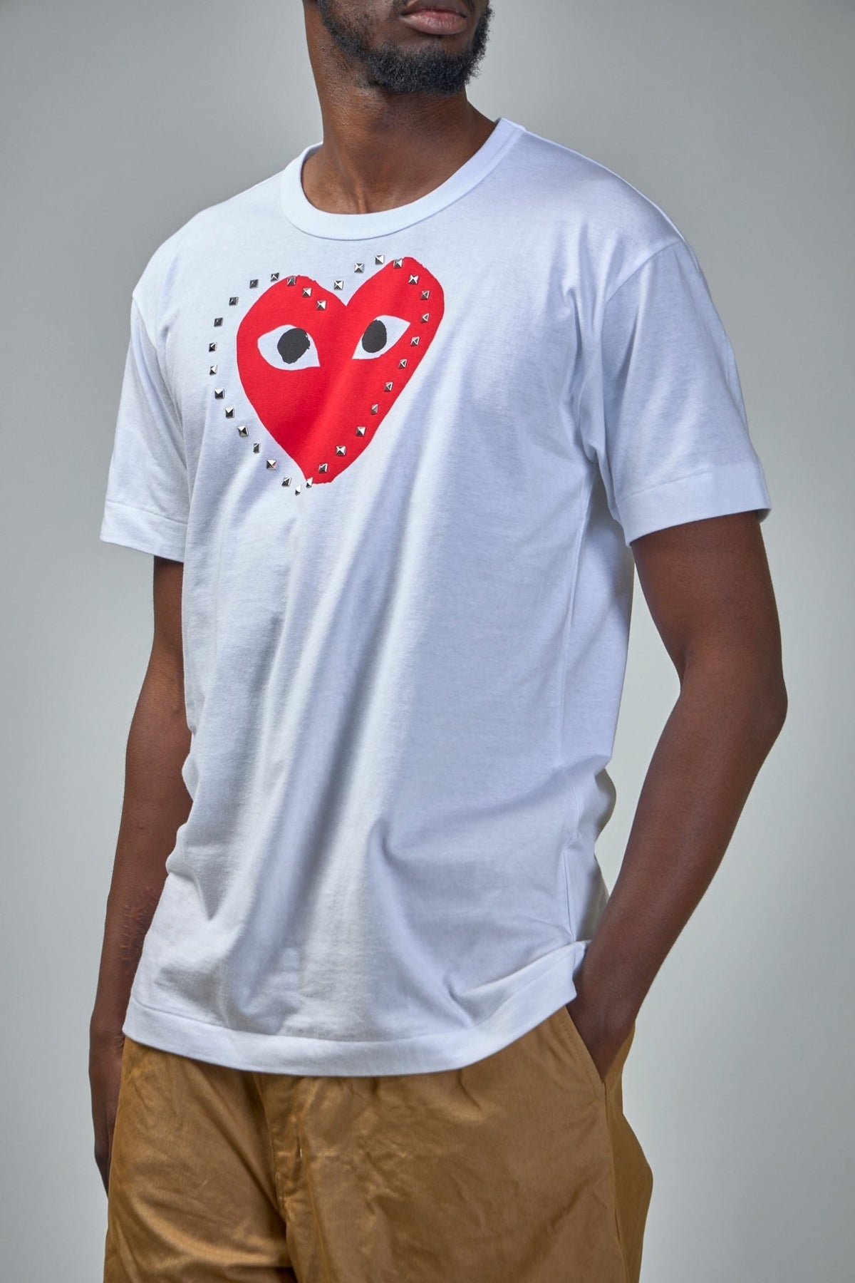 Back view of Comme des Garçons PLAY t-shirt showing clean design lines