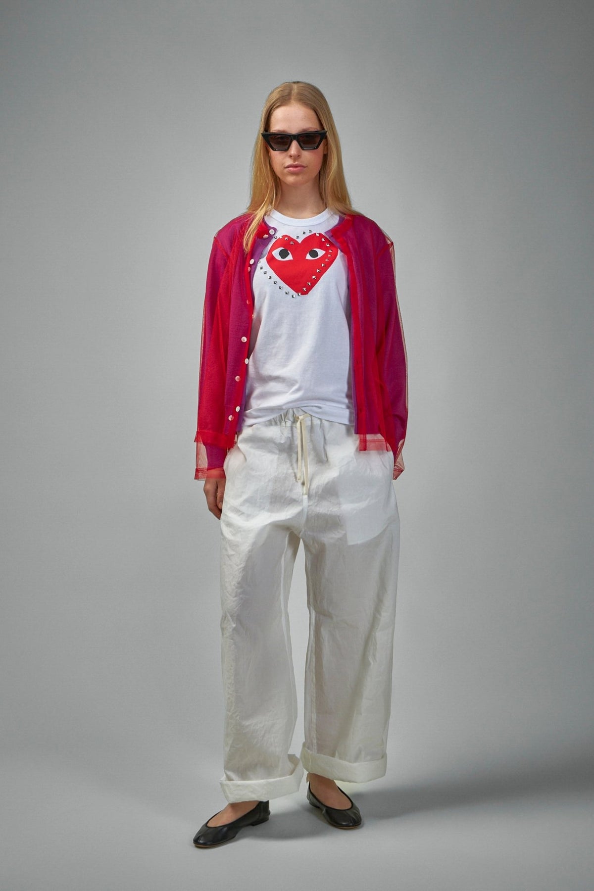 Back view of Comme des Garçons PLAY t-shirt showing clean design lines, view 6