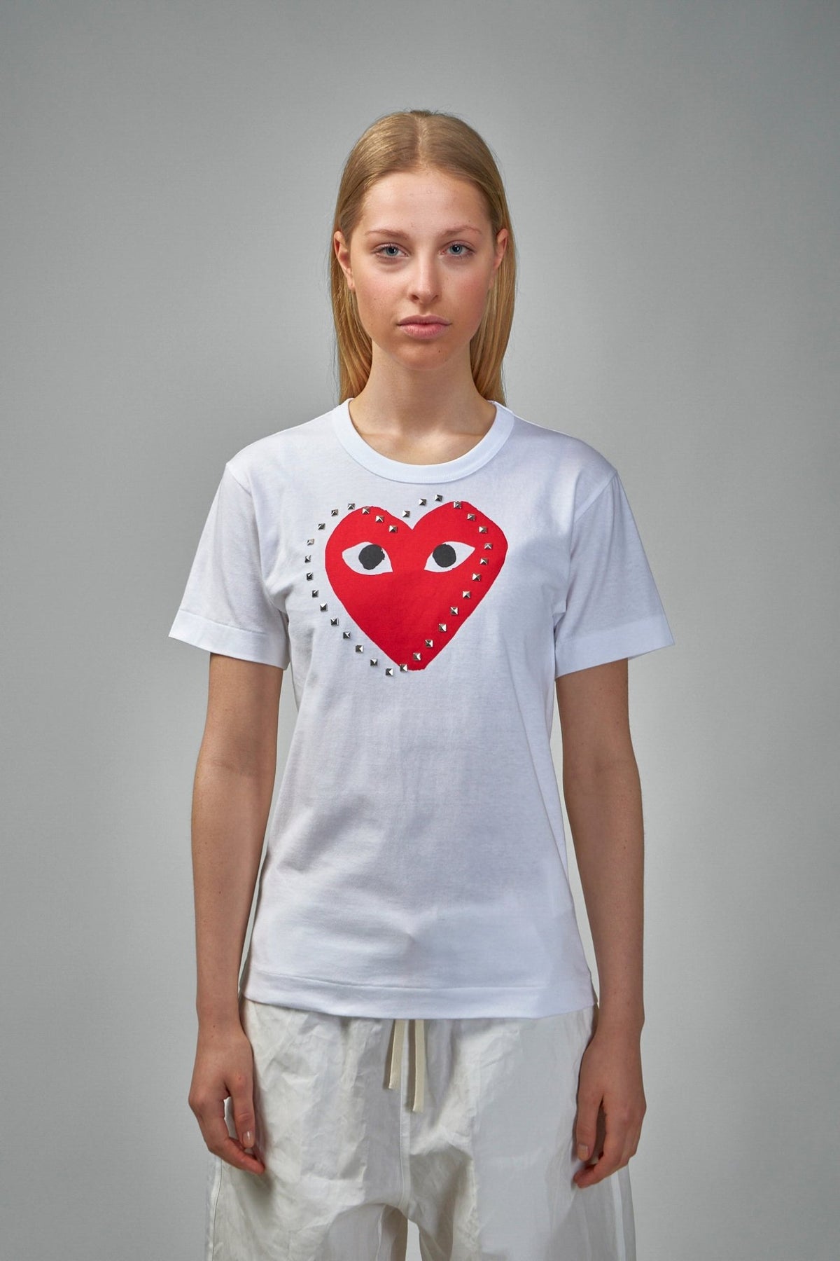 Back view of Comme des Garçons PLAY t-shirt showing clean design lines, view 5