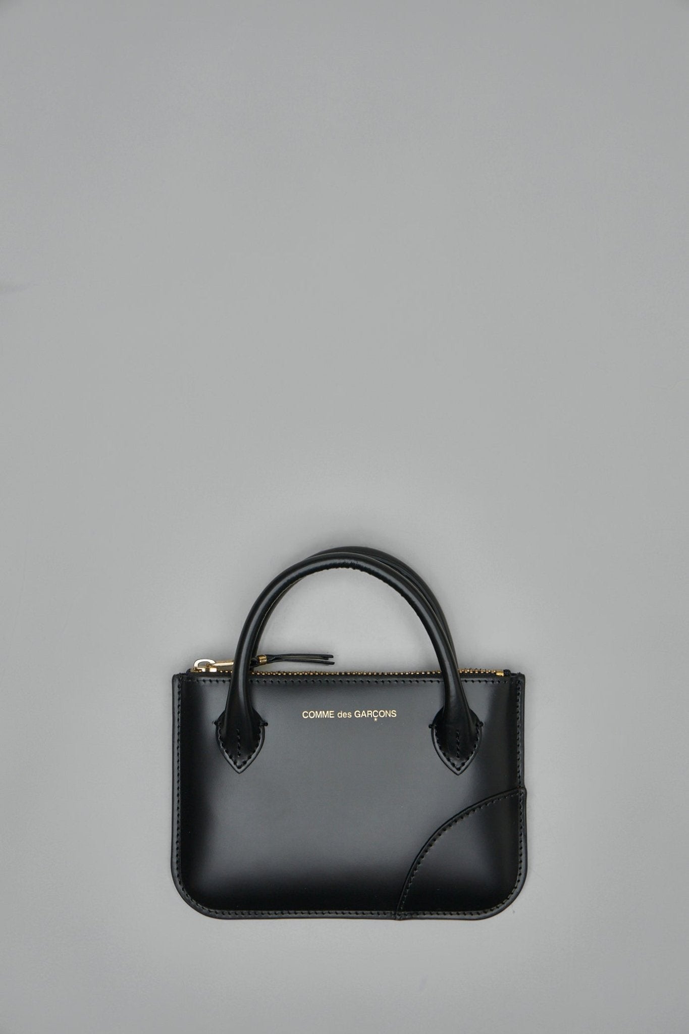 Comme des Garçons Wallets - Handles - LABELS