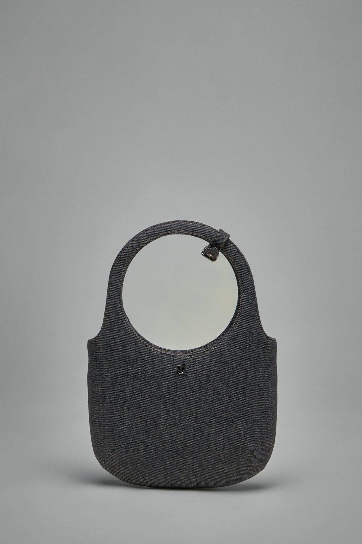 Courrèges Top Handle Bags in denim with signature logo embossing and buckle details