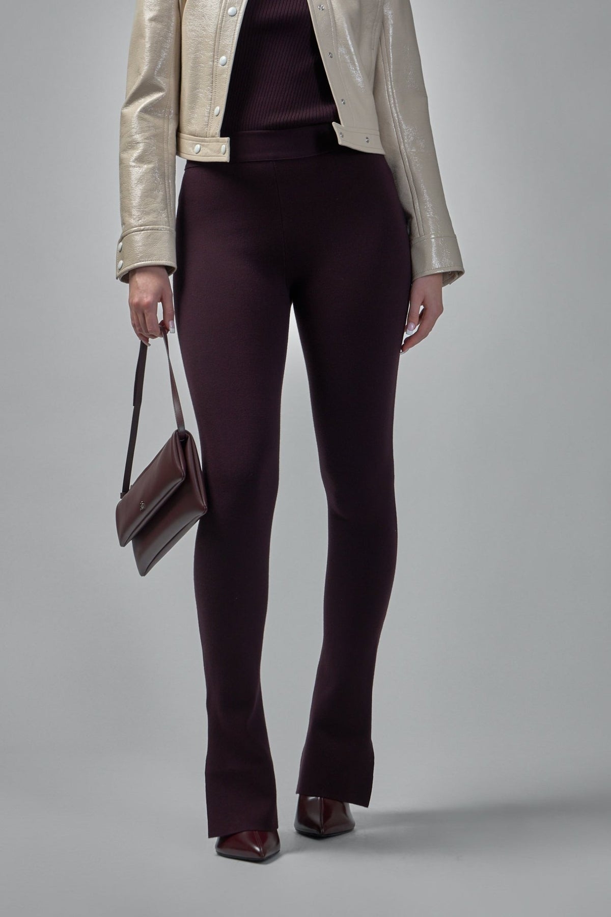 Courrèges straight pants in deep plum stretch knit with ankle strap detail