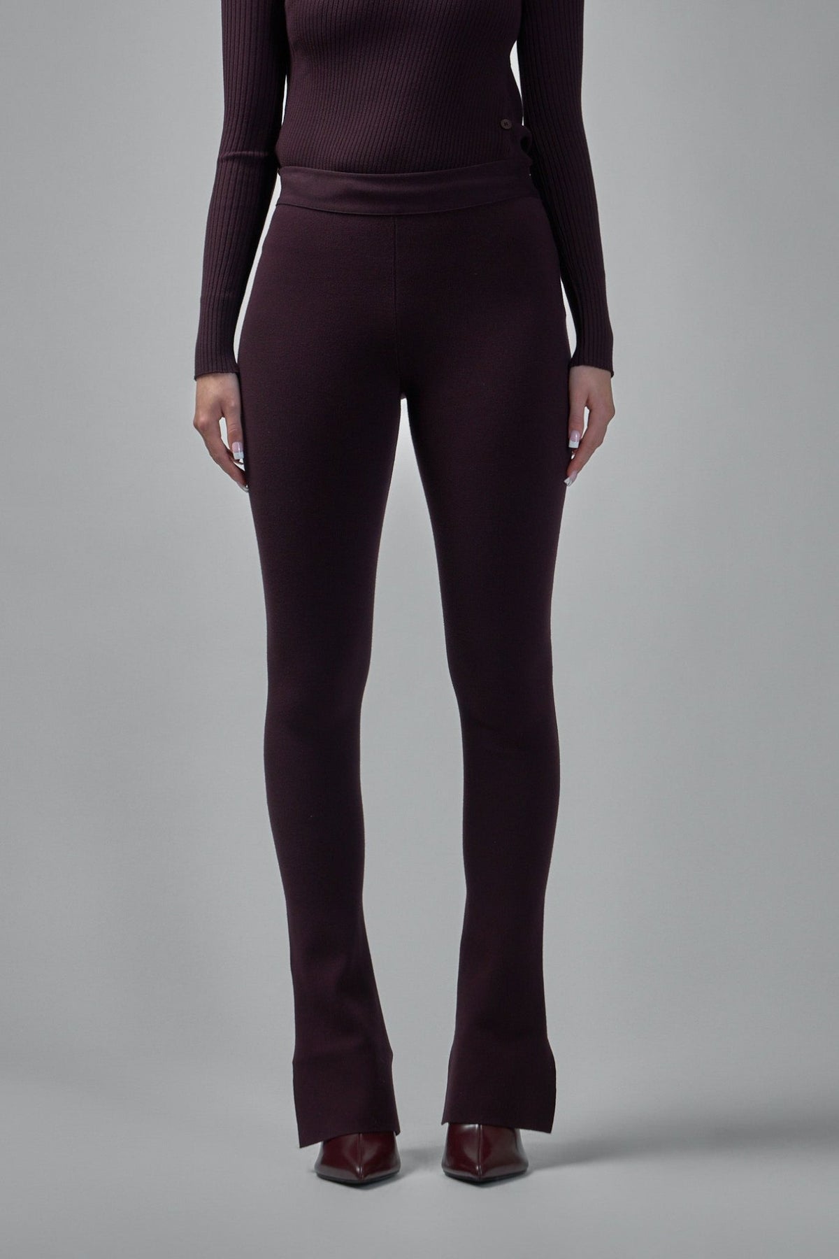 Close-up of high-rise waistband and center front seam on Courrèges pants