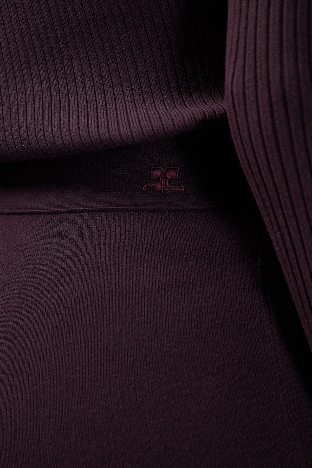 Detail shot of ankle strap tab and hem construction