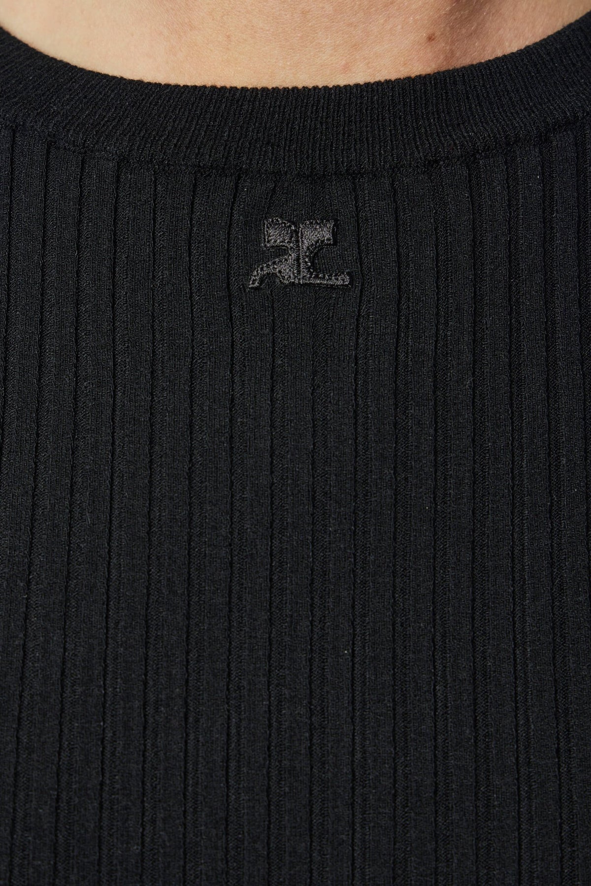 Detail shot of ribbed texture on Courrèges contemporary blouse