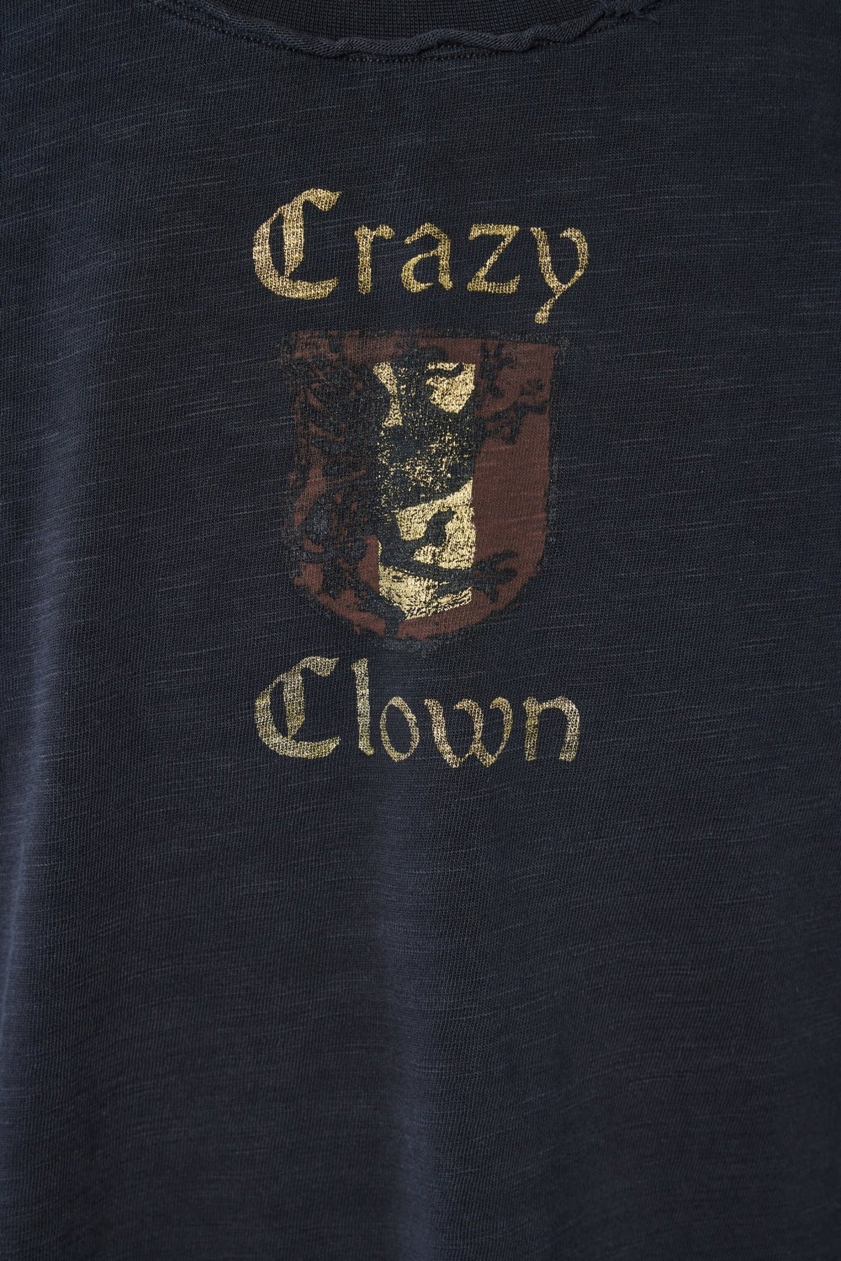 Crazy Clown Reflections In A Blade tee styled with denim