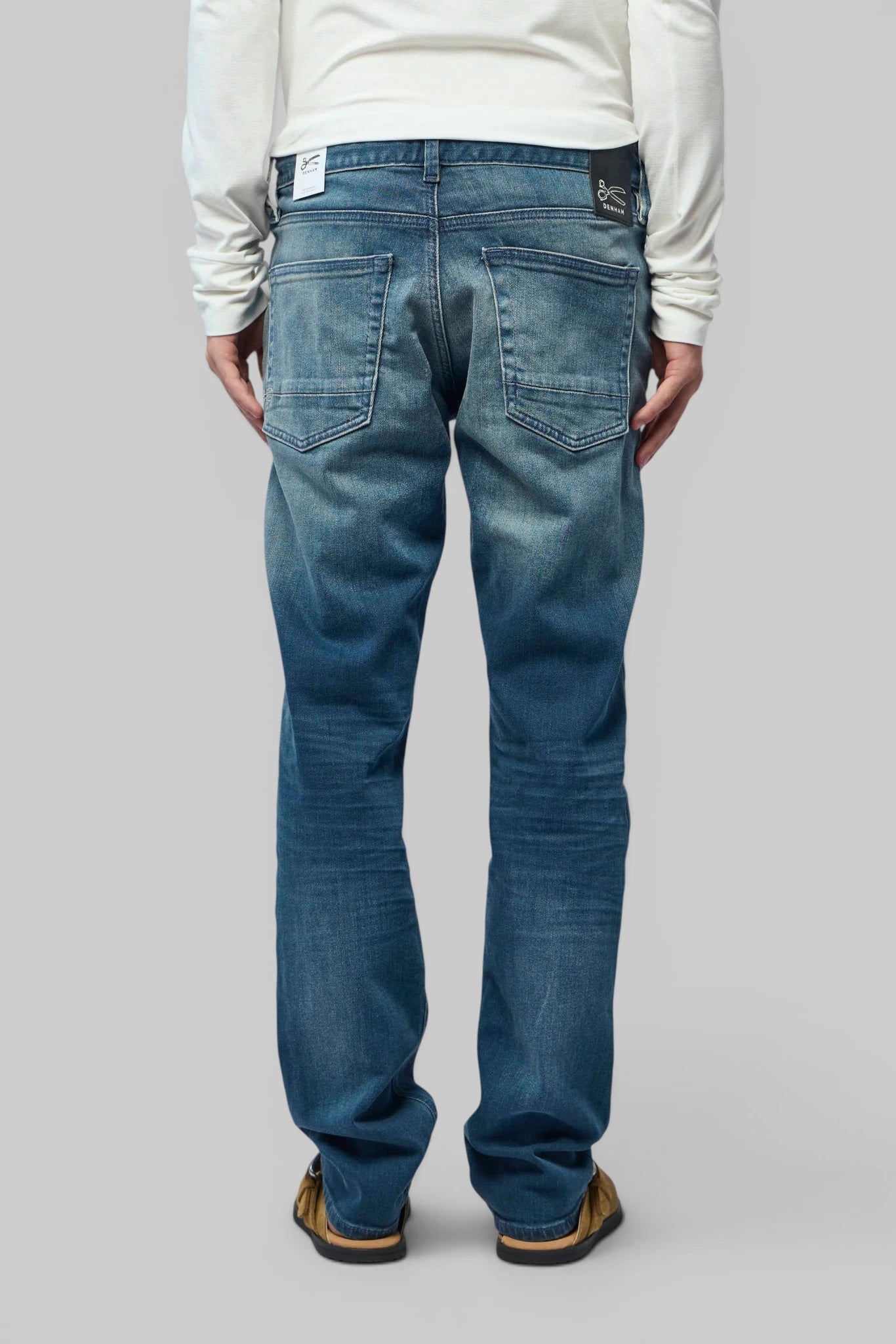 Back view of Denham Straight Jeans with button and zip closure