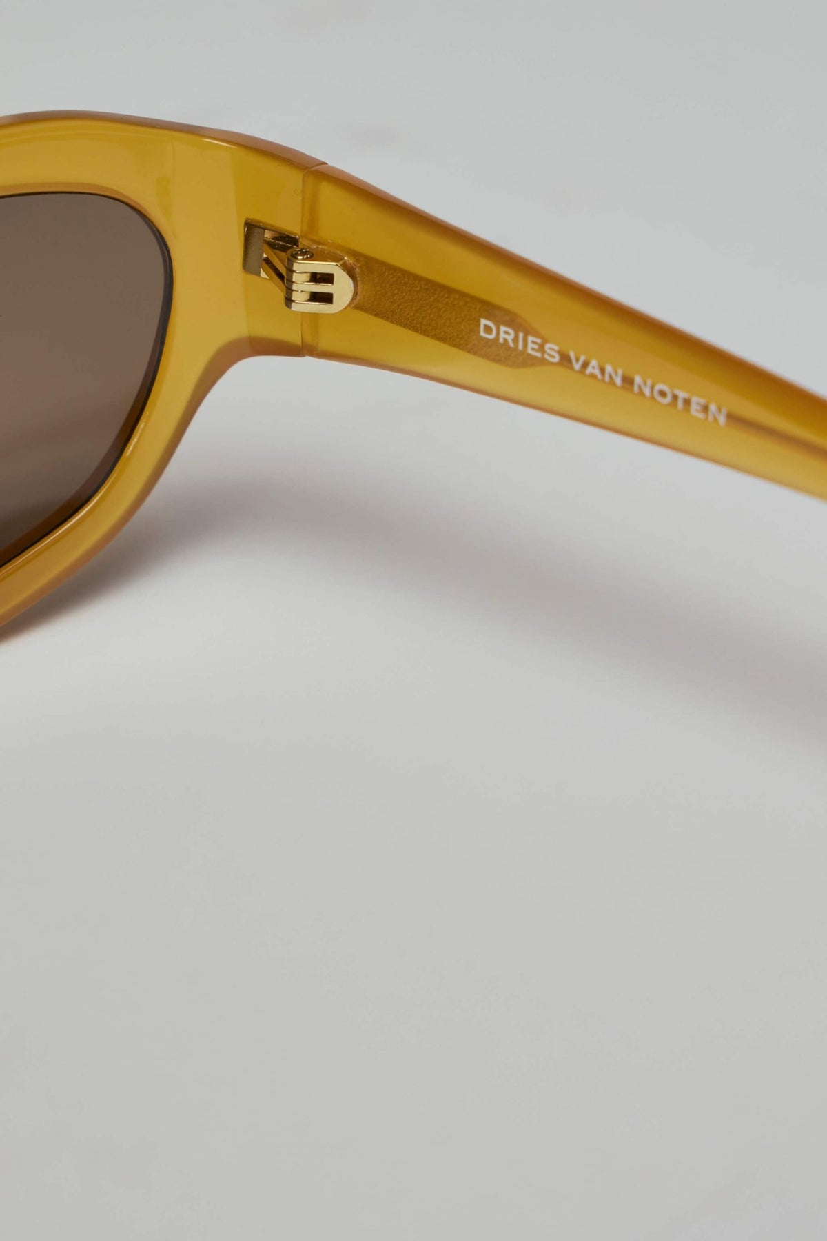 Sunglasses displayed on neutral background showing full design