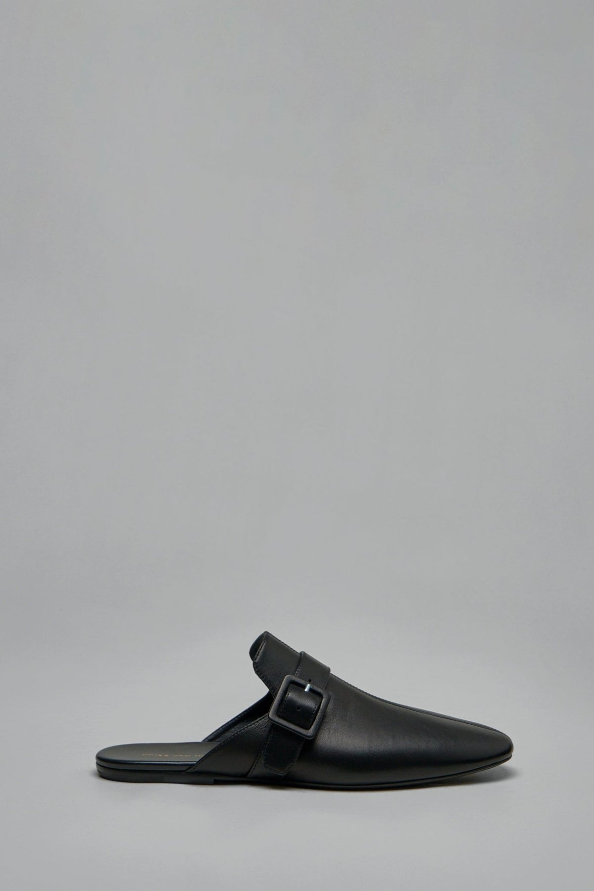 Dries Van Noten mule in smooth black leather, side profile view