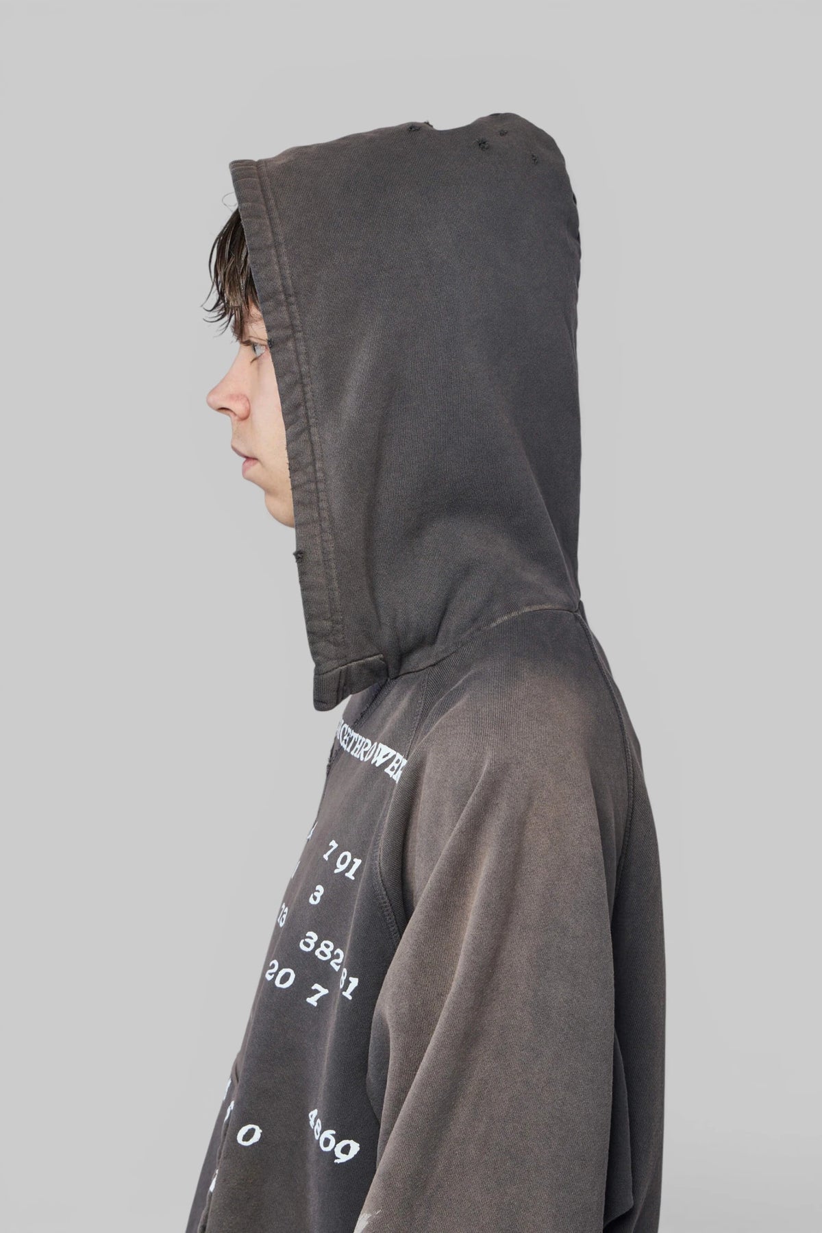 Washed black cotton texture detail of ERD Afterhood