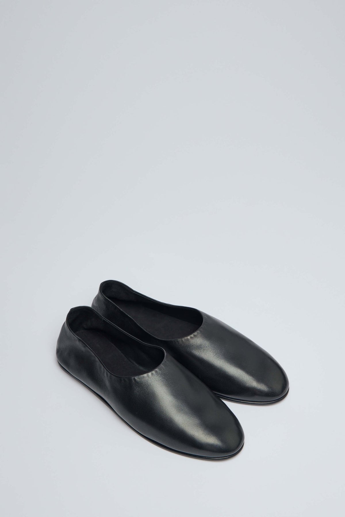 Side view of Fear Of God Ballerino flats highlighting sleek silhouette