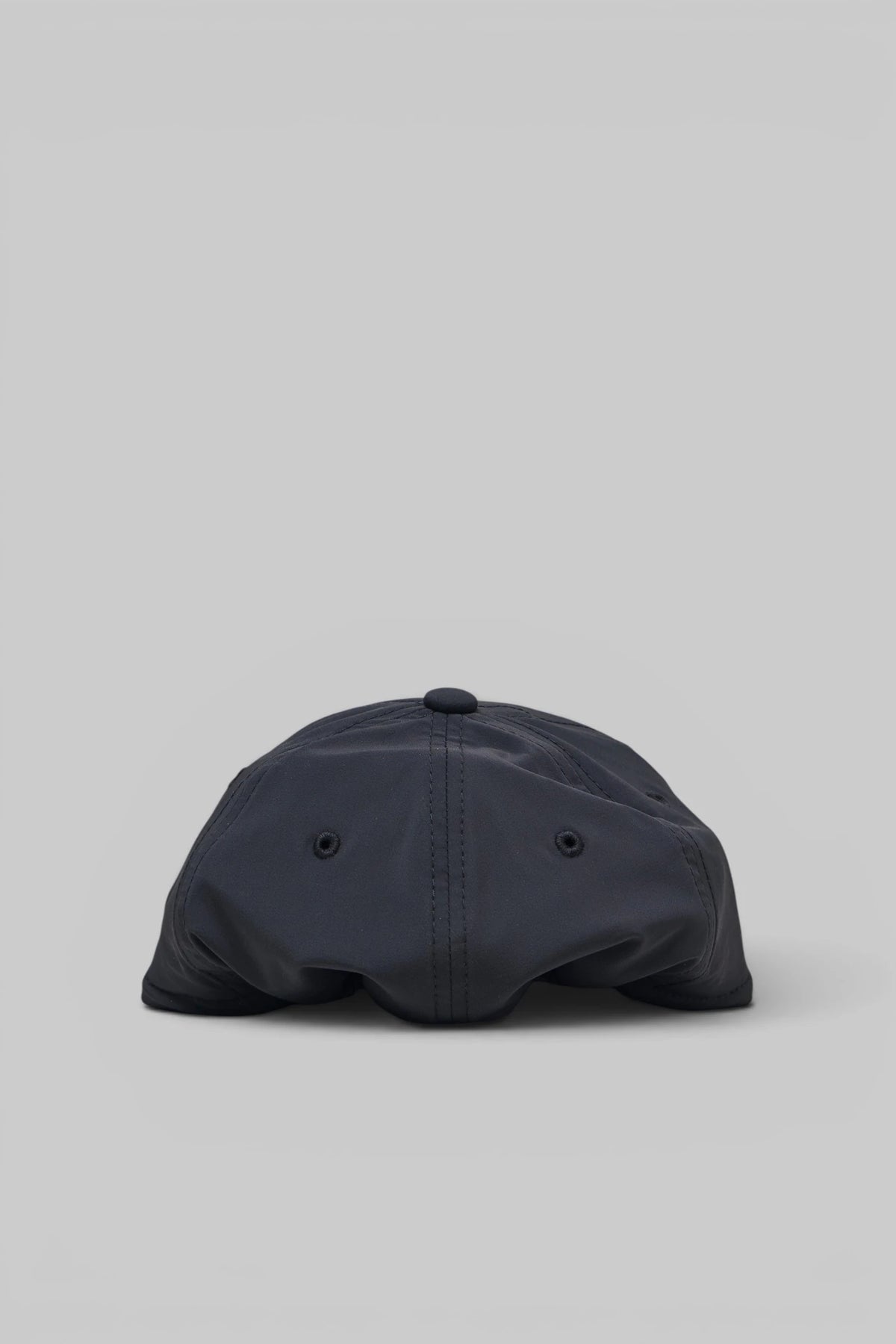 Fear Of God Essentials Caps 5 Panel Nylon Hat embossed branding close-up