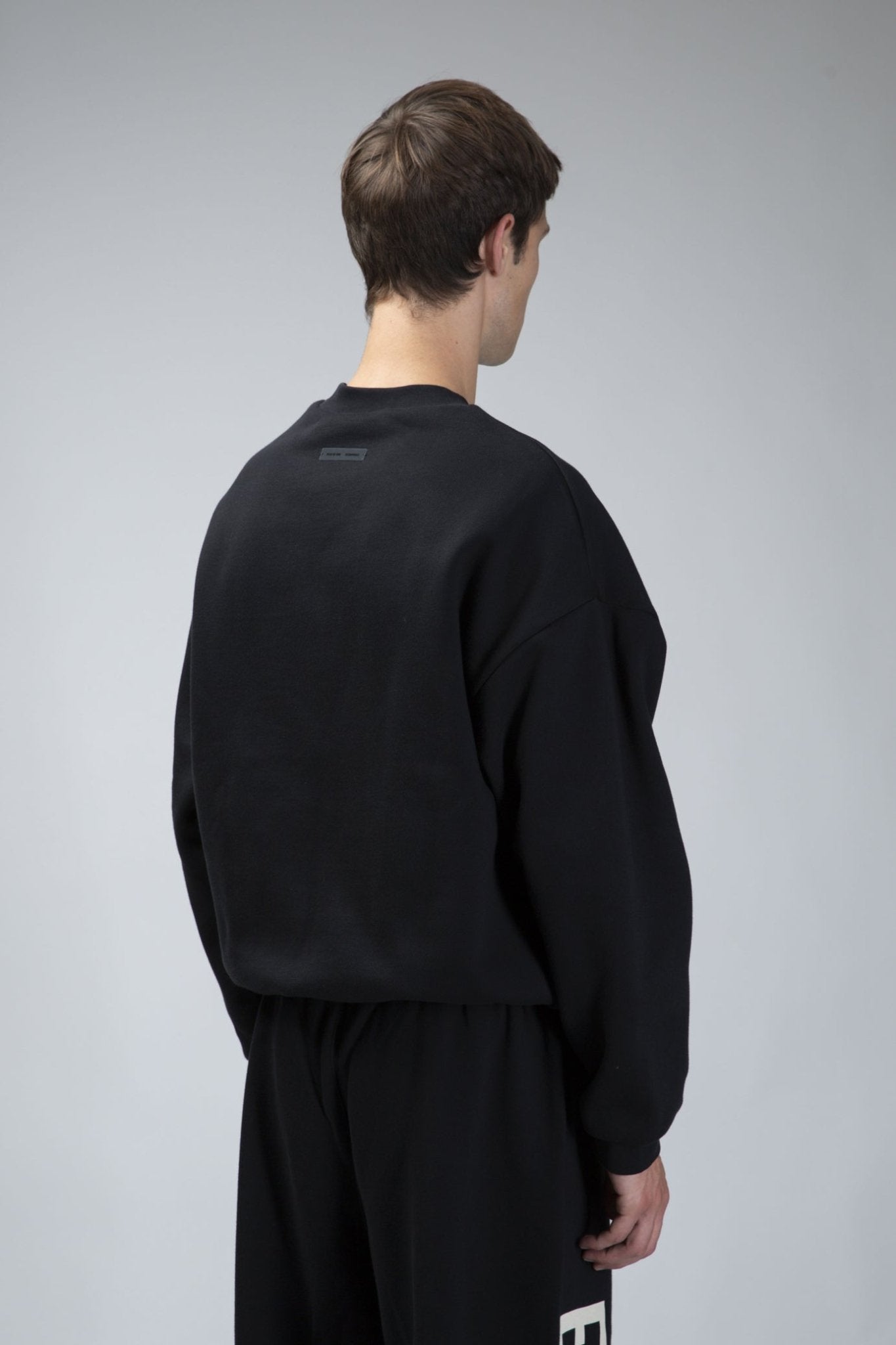 Fear of God Essentials - 90s Fit Fleece Crewneck Jet Black - LABELS