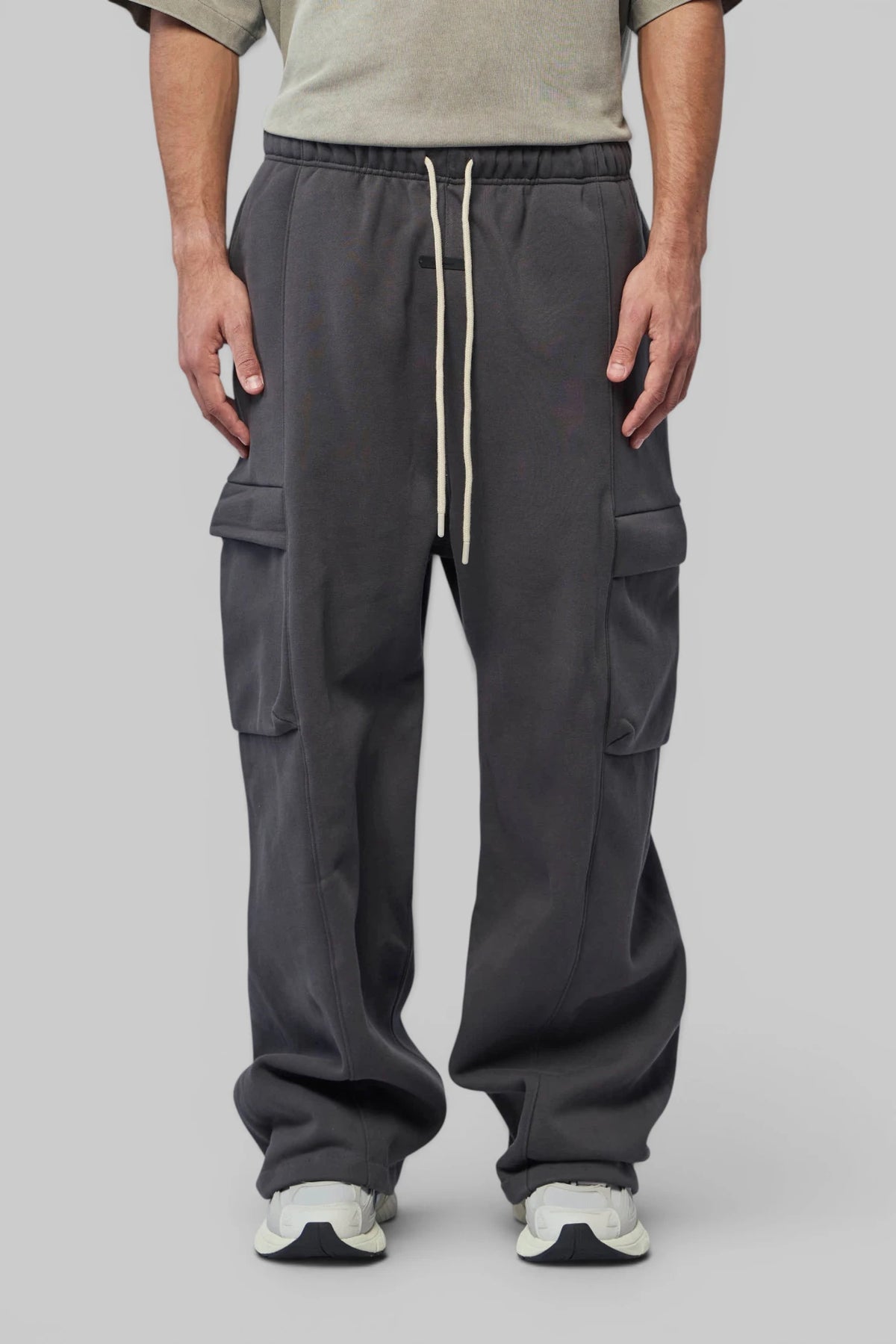 Close-up of cargo pocket detail on Fear Of God Essentials Cargo Pants