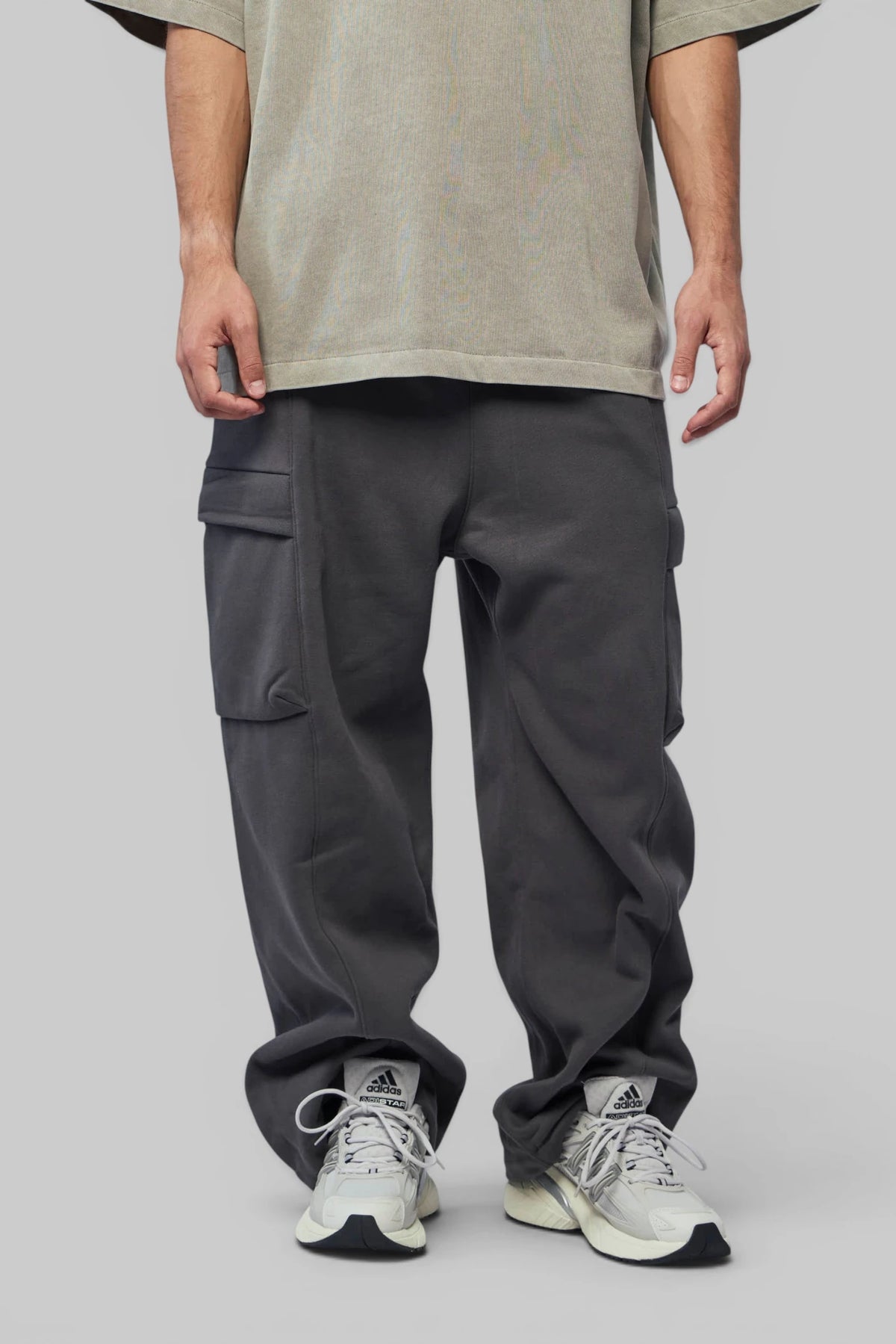 Fear Of God Essentials Cargo Pants in dark grey, front view