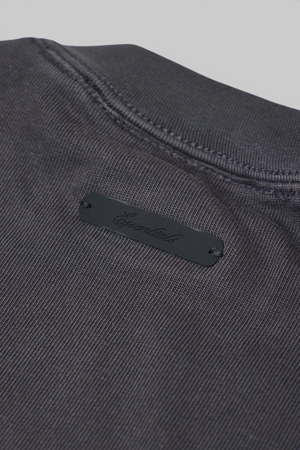 Fear Of God Essentials Kids 90's Short Sleeve Tee styled for casual everyday wear