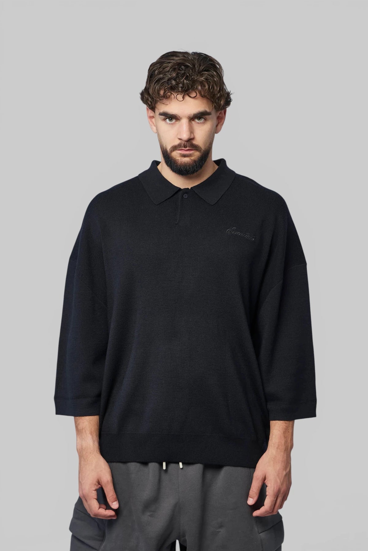 Close-up of polo collar on Fear Of God Essentials Knitwear top