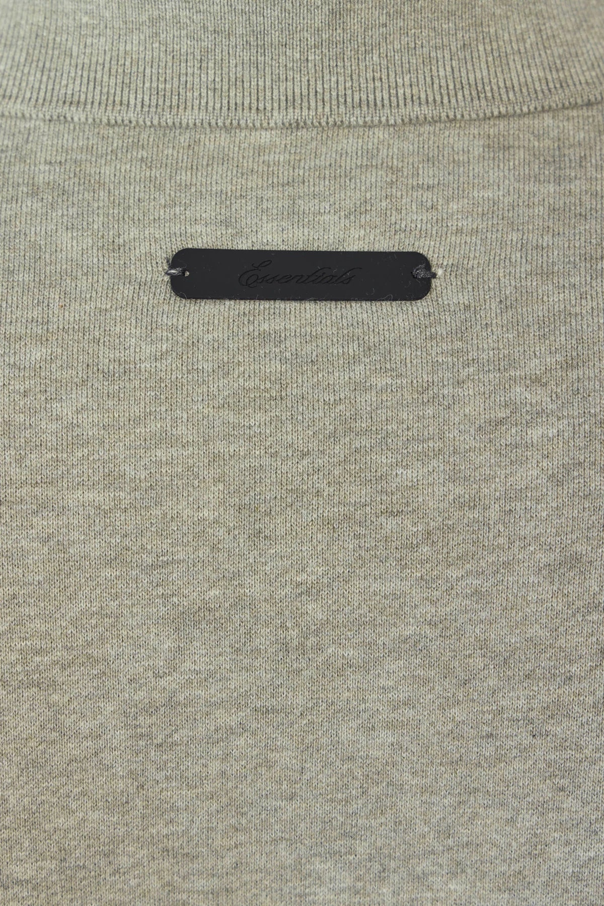 Fear Of God Essentials Signature 90's Polo Sweatshirt side profile detail