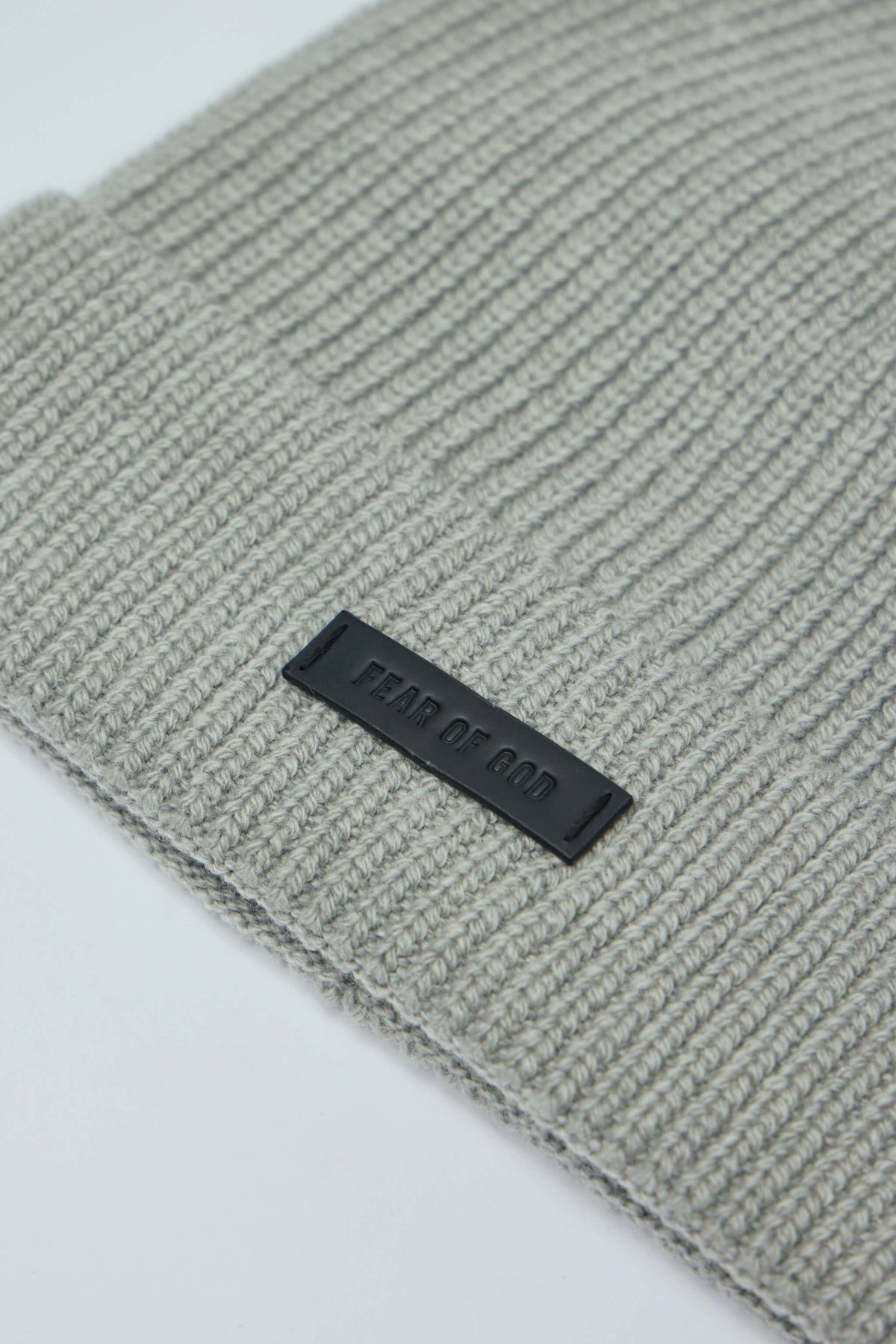 Fear of God knit beanie styled with contemporary streetwear outfit