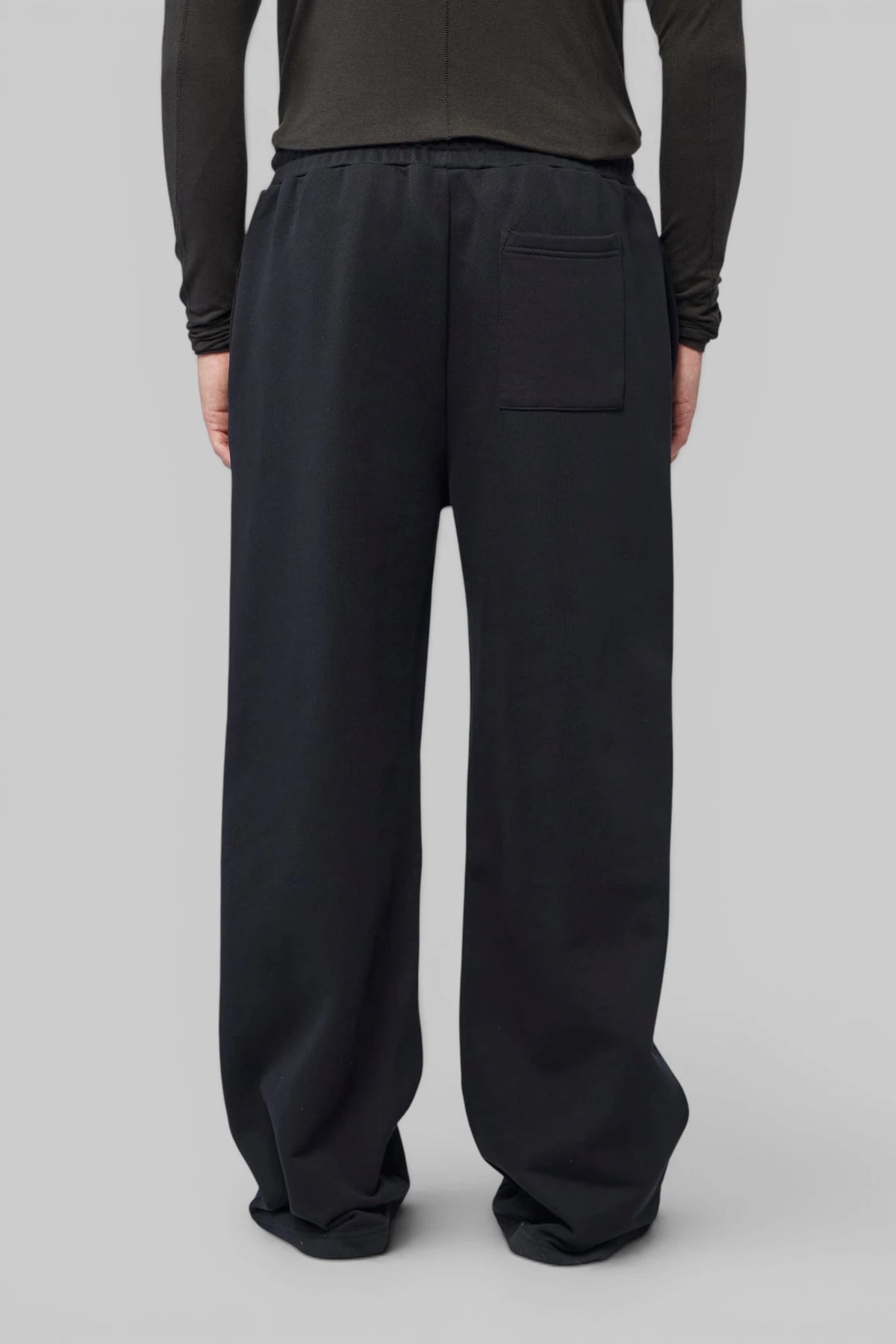 Back view of FLÂNEUR Wide-Leg Pants highlighting wide-leg cut