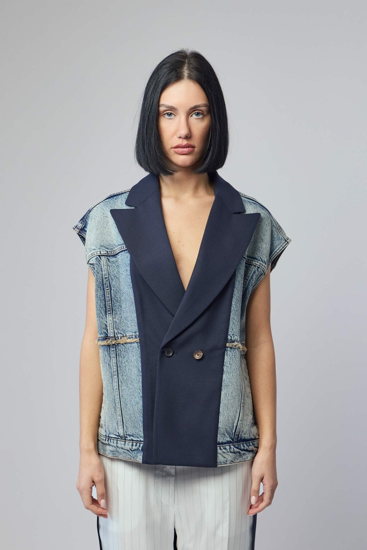 Navy blazer with structured tailoring and premium cotton construction
