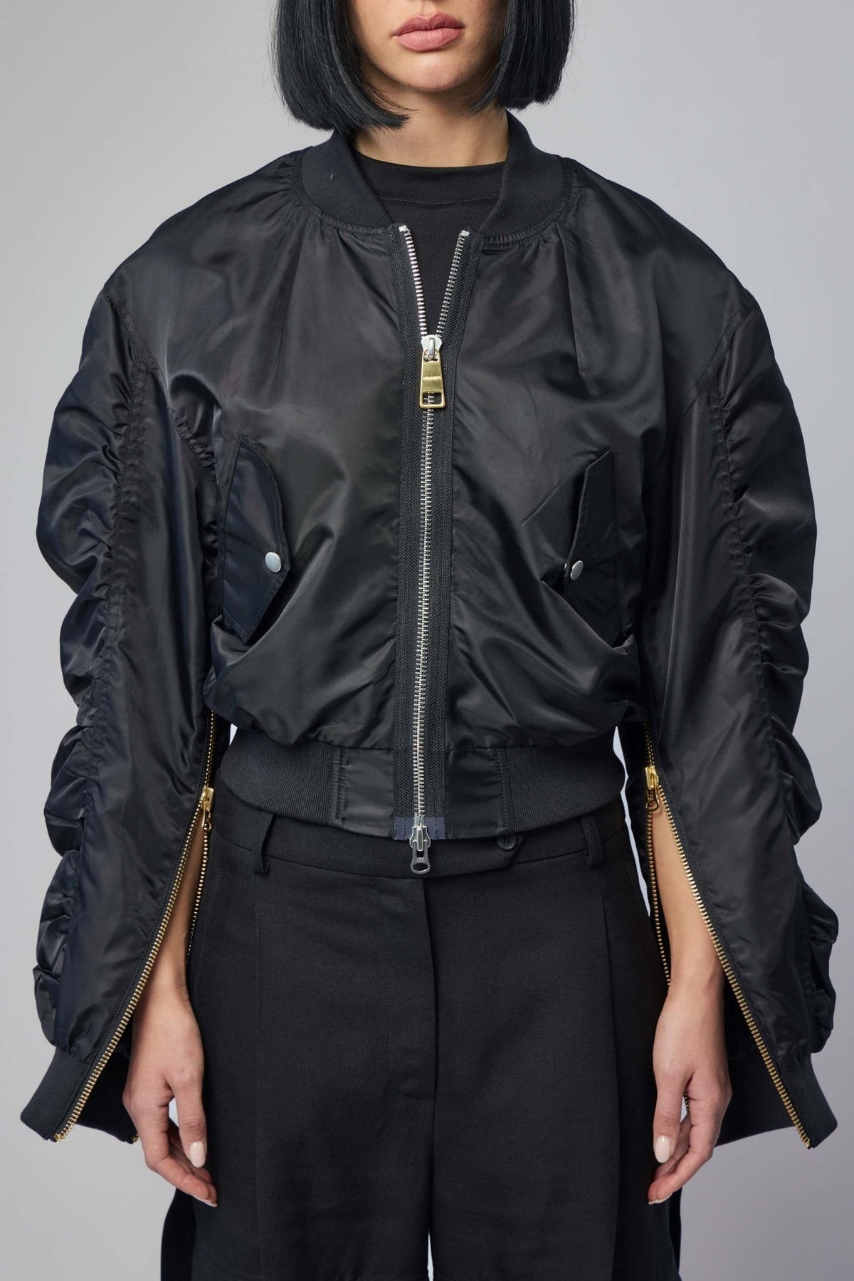 Frenken bomber jacket flat lay showing contemporary silhouette